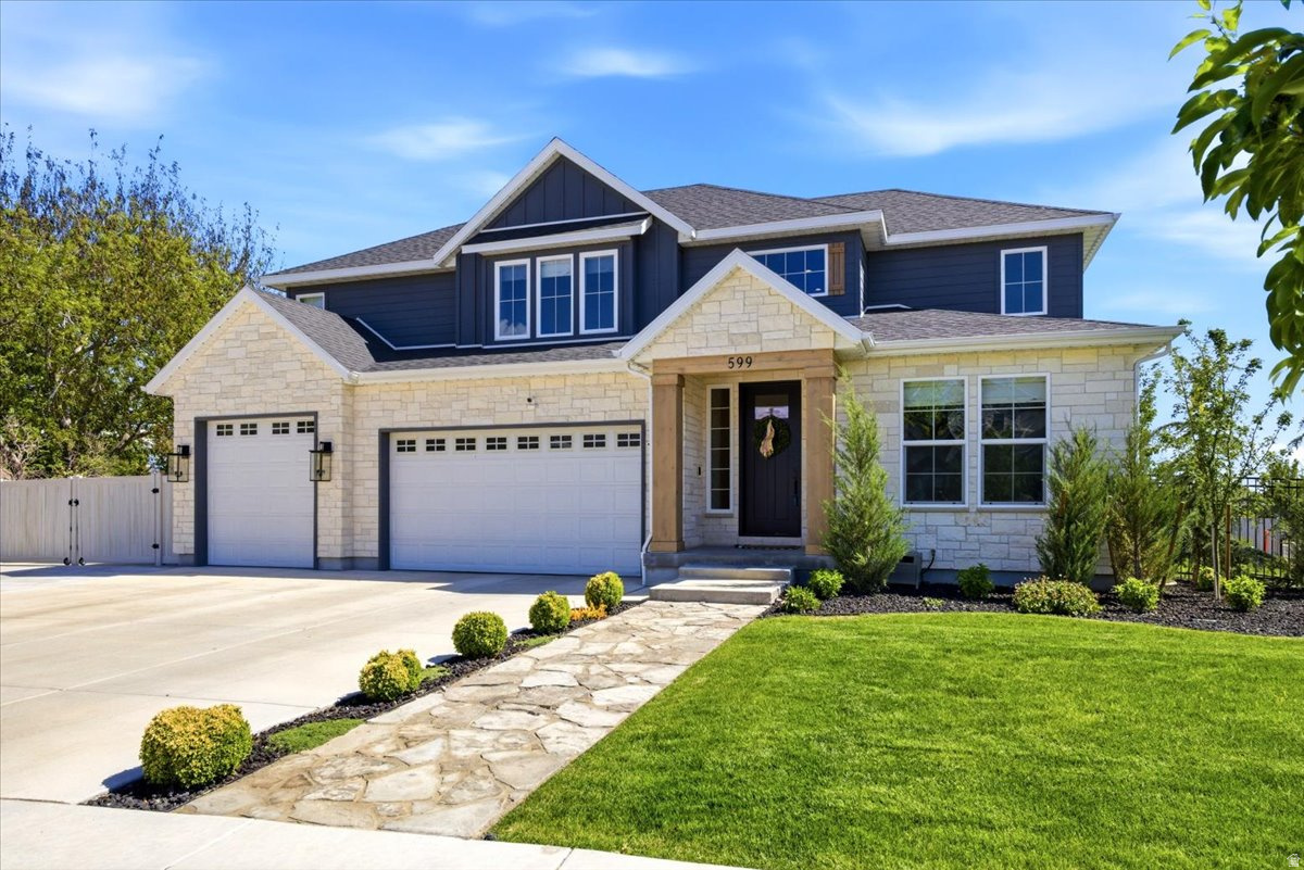 Home is priced to sell.  You won't find a better deal in this area with this quality.    Gorgeous Family Home in a Prime Location Welcome to this stunning, large family home situated in one of the area's most highly sought-after neighborhoods. Every detail of this property has been carefully curated, featuring premium upgrades and hand-selected colors, finishes, and custom modifications throughout. Key Property Features: Premium Upgrades: Elegant real stone accents, beautiful Roman shades, and permanent exterior lighting. Gourmet Kitchen: Features a massive, oversized island and a spacious walk-in butler's pantry perfect for hosting. Main-Floor Owner's Suite: A luxurious retreat complete with a custom master closet and a dedicated laundry room located just steps away. Fully Finished Basement: Includes a home gym, ample living space, a convenient walk-out, and dedicated exterior stairs. Upper Level: Features a versatile upstairs loft, perfect for a playroom, media space, or home office. Outdoor Living: Fully landscaped yard complete with a dedicated garden area, plus a newly resurfaced RV pad. This home is packed with high-end features and thoughtful extras at every turn-schedule your tour today to experience it all in person!  Square footage figures are provided as a courtesy estimate only and were obtained from ______________ .  Buyer is advised to obtain an independent measurement.