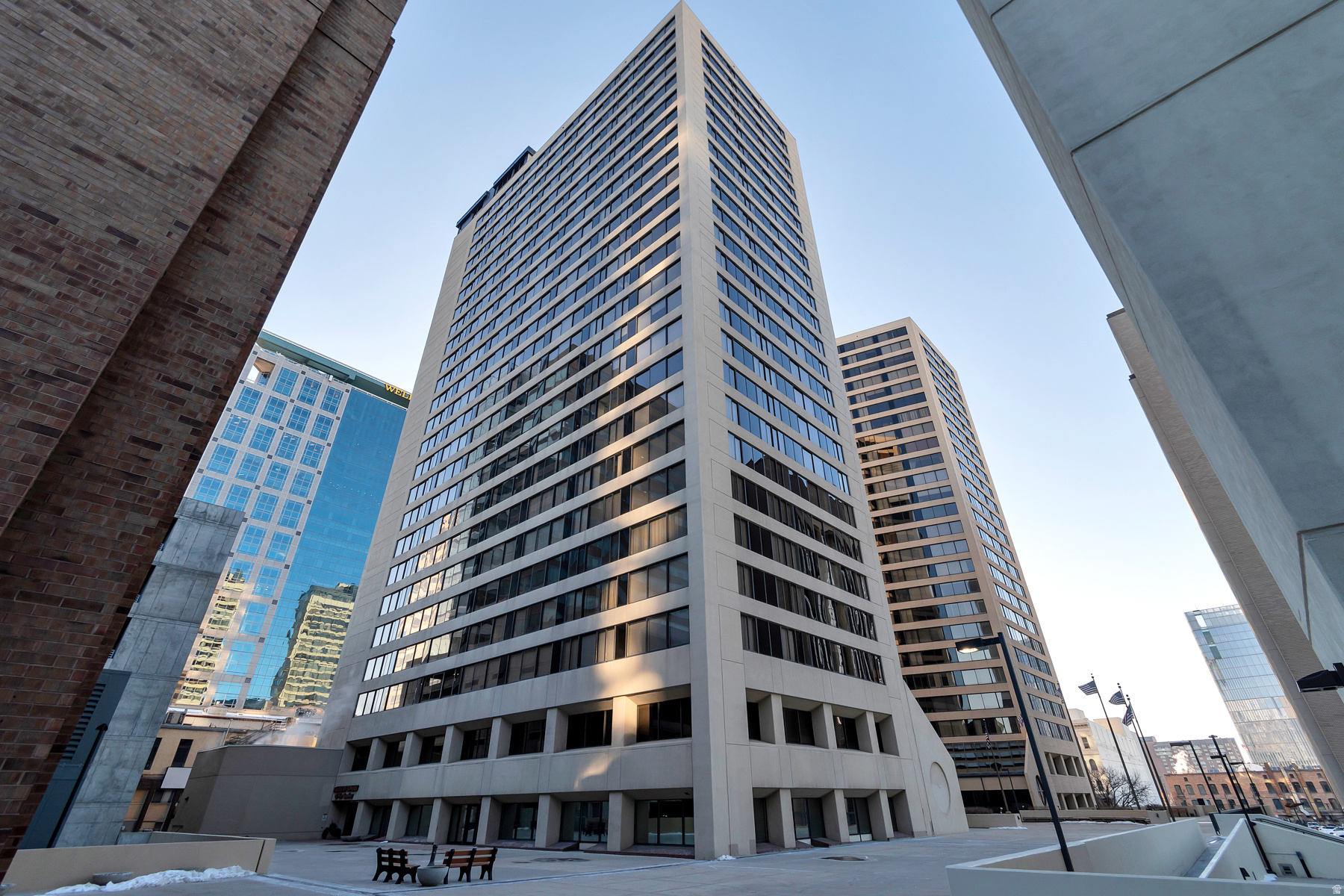 Experience downtown living at its best in this beautifully maintained condo located in the heart of Salt Lake City. This secure building offers concierge service and a welcoming atmosphere, featuring 2 spacious bedrooms plus a dedicated office space-perfect for working from home. Enjoy a generously sized kitchen and dining area ideal for entertaining, along with the convenience of one covered parking space and a private storage shed. Residents have access to fantastic amenities including a swimming pool, hot tub, racquet ball court, library, and an on-site car wash. The HOA covers water, sewer, garbage, gas, and internet, making for easy, low-maintenance living. Step outside and walk to everything downtown has to offer, hop on nearby public transportation, or enjoy the vibrant nightlife just minutes from your door.