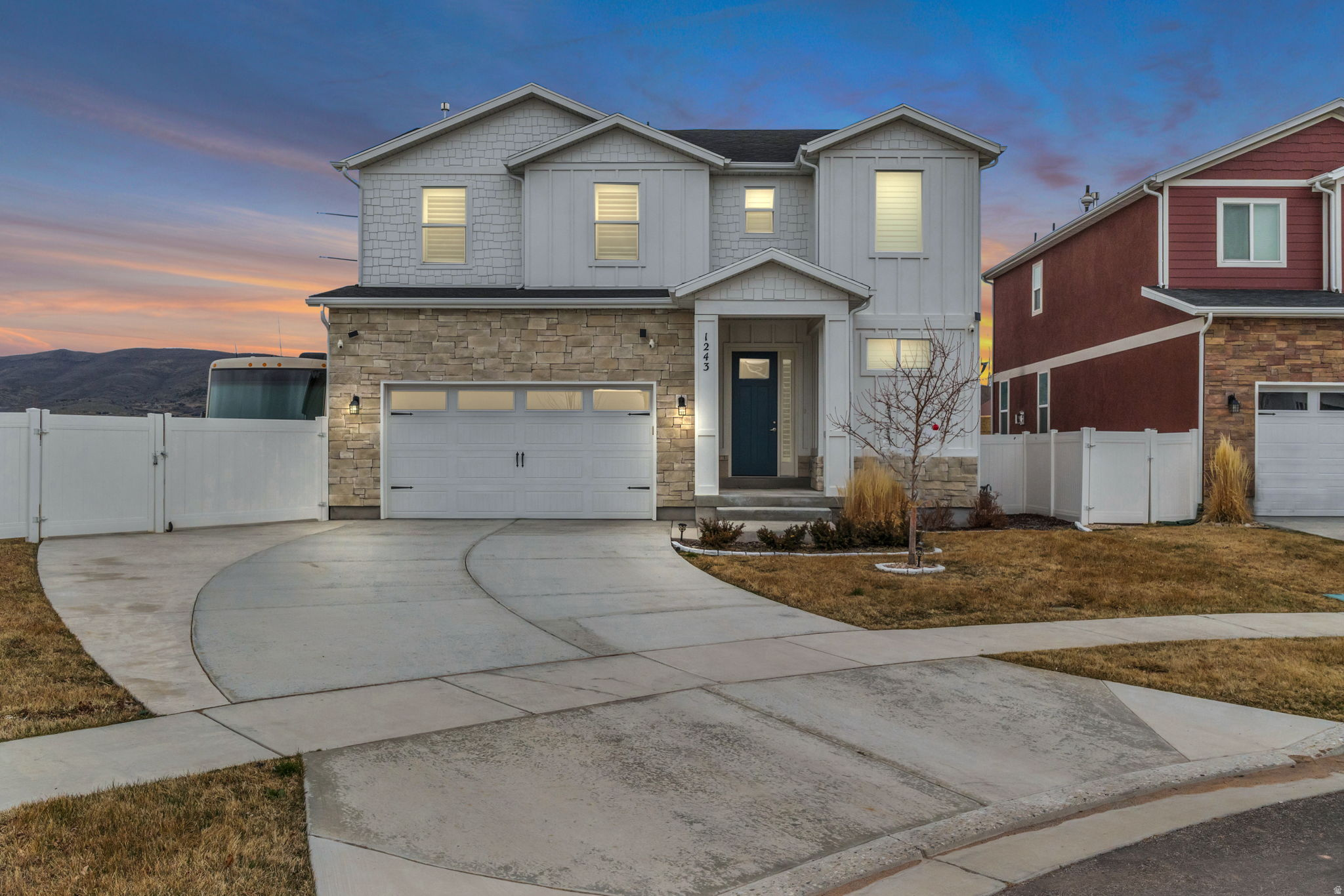 Welcome to 1243 S 1040 E, an exceptional single-family residence for sale spanning 3,553 square feet on a premier 0.28-acre cul-de-sac lot in the highly sought-after Brookside subdivision of Heber City, Utah. Built in 2021, this traditional two-story masterpiece seamlessly blends luxury finishes with practical, functional design. The inviting, open-concept main floor features soaring 9-foot-plus ceilings, striking open beams, and a cozy gas fireplace, flowing effortlessly into a chef-inspired kitchen complete with a walk-in pantry and premium gas appliances. Up the stairs, you will find a dedicated home office den, a convenient laundry room, and three generously sized bedrooms-including a primary suite retreat boasting an oversized walk-in closet and a spa-like jetted tub. Elegant laminate, durable tile, and plush carpet sweep underfoot, while luxury plantation shutters frame stunning valley views. For those looking to maximize their equity, the full, unfinished basement offers an expansive blank canvas ready to be converted into a custom home theater, gym, or extra guest suites.  Outdoor enthusiasts and adventure lovers will appreciate the property's exterior durability, clad in stone, stucco, and HardiPlank cement siding, accented by a massive, dedicated 50-foot RV parking pad running down the side of the home. Paired with the attached 2-car garage, this spacious setup easily accommodates up to six vehicles for your trucks, boats, and trailers. Step outside onto the covered back patio to soak in breathtaking, unobstructed Wasatch Back mountain views, or host summer gatherings utilizing the pre-stubbed gas BBQ line-all while enjoying an effortlessly maintained yard complete with automated sprinklers and partial drip irrigation. Located within a top-tier school district (Daniels Canyon Elementary, Timpanogos Middle, and Wasatch High) and managed by a low-fee HOA, this property is a premium opportunity. Offering a truly turnkey solution for a primary residence or secondary vacation retreat, the custom home furnishings are also negotiable via a separate bill of sale.