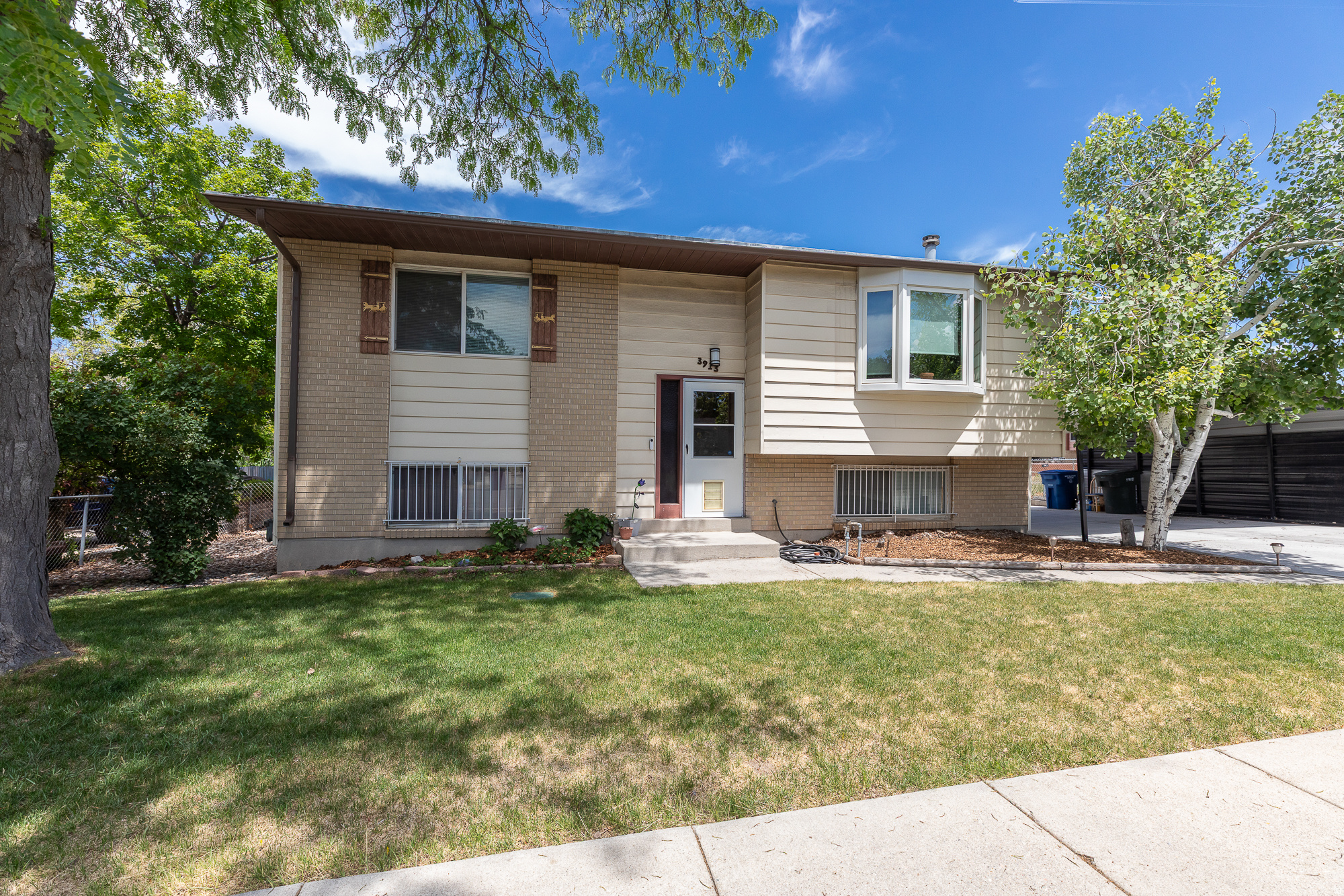 ****MULTIPLE OFFERS RECEIVED!! HIGHEST AND BEST BY THURSDAY JUNE 11, at 5PM****This is a great 4 bed, 2 bath property for investment, or for a single family willing to give it a little love and attention. Cash or Conventional financing only. The property has great bones and tons of potential.. The large corner lot has plenty of room for a large RV pad or a large garden (already fenced off. Much of the home has been updated over the years. The HVAC was replaced within the last 6 years (approx). The home also features a large trex and vinyl deck, a two-car carport, updated kitchen and a great wood burning stove in the basement. Don't miss your chance at a fantastic property at this pricepoint!! This home wont last! This home is being sold AS-IS, and is priced accordingly. Buyer is advised to verify all information. Square footage figures are provided as a courtesy estimate only and were obtained from county records. Buyer is advised to obtain an independent measurement. Please allow 48 hour response time on all offers.