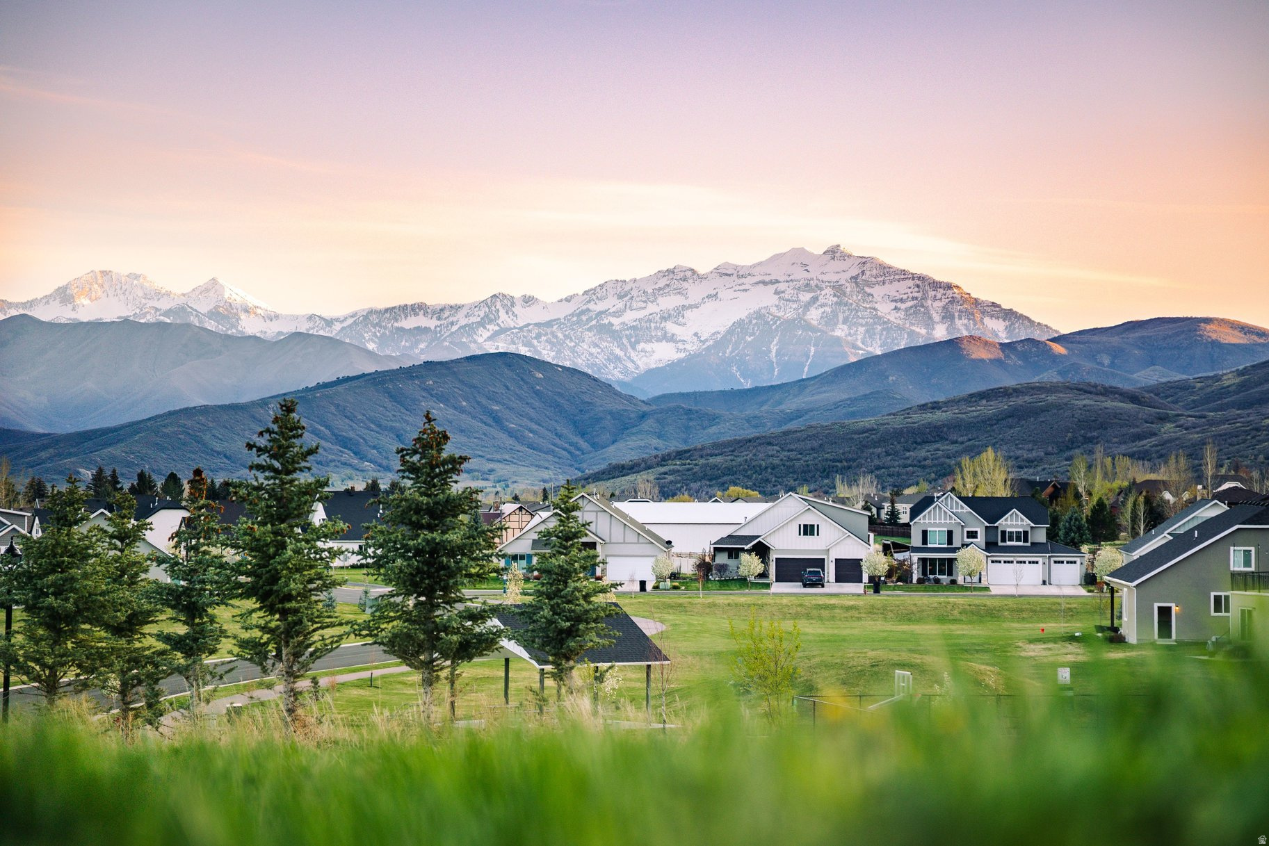 Set on a gently elevated one-acre homesite in The Farm at Wilson Lane, this property captures sweeping views of Mount Timpanogos and the surrounding Wasatch Mountains. Few opportunities remain that offer this combination of privacy, flexibility, and room to create something truly your own. With no HOA and no required build timeline, owners have the freedom to choose their own builder, design on their own terms, and build when the timing feels right. Whether envisioning a full-time residence, a mountain retreat, or a legacy property to be enjoyed for generations, this homesite provides a rare blank canvas in one of Midway's most desirable settings. Life here is defined by a pace that feels increasingly difficult to find. Mornings begin with mountain views and open skies. Surrounded by year-round recreation, afternoons might include a round of golf at Homestead Golf Course, Wasatch Mountain State Park or Soldier Hollow, boating on Deer Creek Reservoir or world-class skiing at Deer Valley's East Village. Miles of hiking and biking trails are easily accessible, along with unique local experiences such as the Homestead Crater and Midway Swiss Days. Evenings bring a return to the quiet charm of Midway, where local restaurants, cafs, and community traditions foster a genuine sense of place. As growth continues throughout the greater Park City area, The Farm at Wilson Lane offers something increasingly scarce: space, freedom, and the opportunity to create a custom home without the constraints of club memberships, HOA oversight, or construction deadlines. Secure the homesite today and build the future on your own timeline.