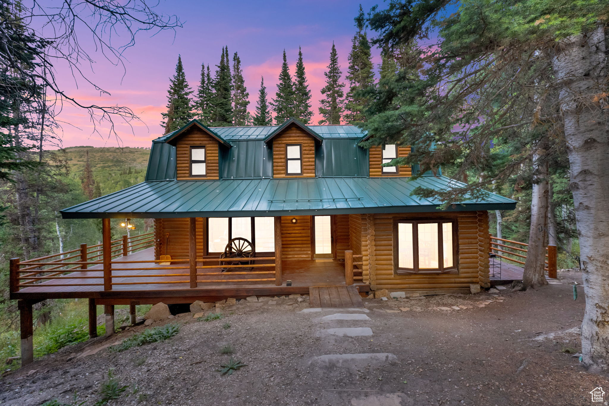 Discover the ultimate mountain retreat--a log cabin so tucked away in the trees, you'll feel like you've stepped into your own private forest! Nestled on a quiet street with soaring pines all around, this rare gem offers unmatched seclusion and year-round beauty. From the wrap-around deck, enjoy the peaceful sound of the river and visits from incredible wildlife. Wander down the established trail for a serene stroll that leads directly down to the river! Inside, rustic charm meets comfort with an updated kitchen, cozy gathering spaces, plenty of room to entertain & host weekend getaways and that unmistakable log cabin warmth. And when the snow falls-- Snowmobiling is literally out your front door! Adventure, serenity, and storybook cabin living, this one has it all. Only an hour to the SLC airport, 45 minutes to Provo and just minutes from all the fabulous amenities of the Heber Valley, Midway & Park City.
