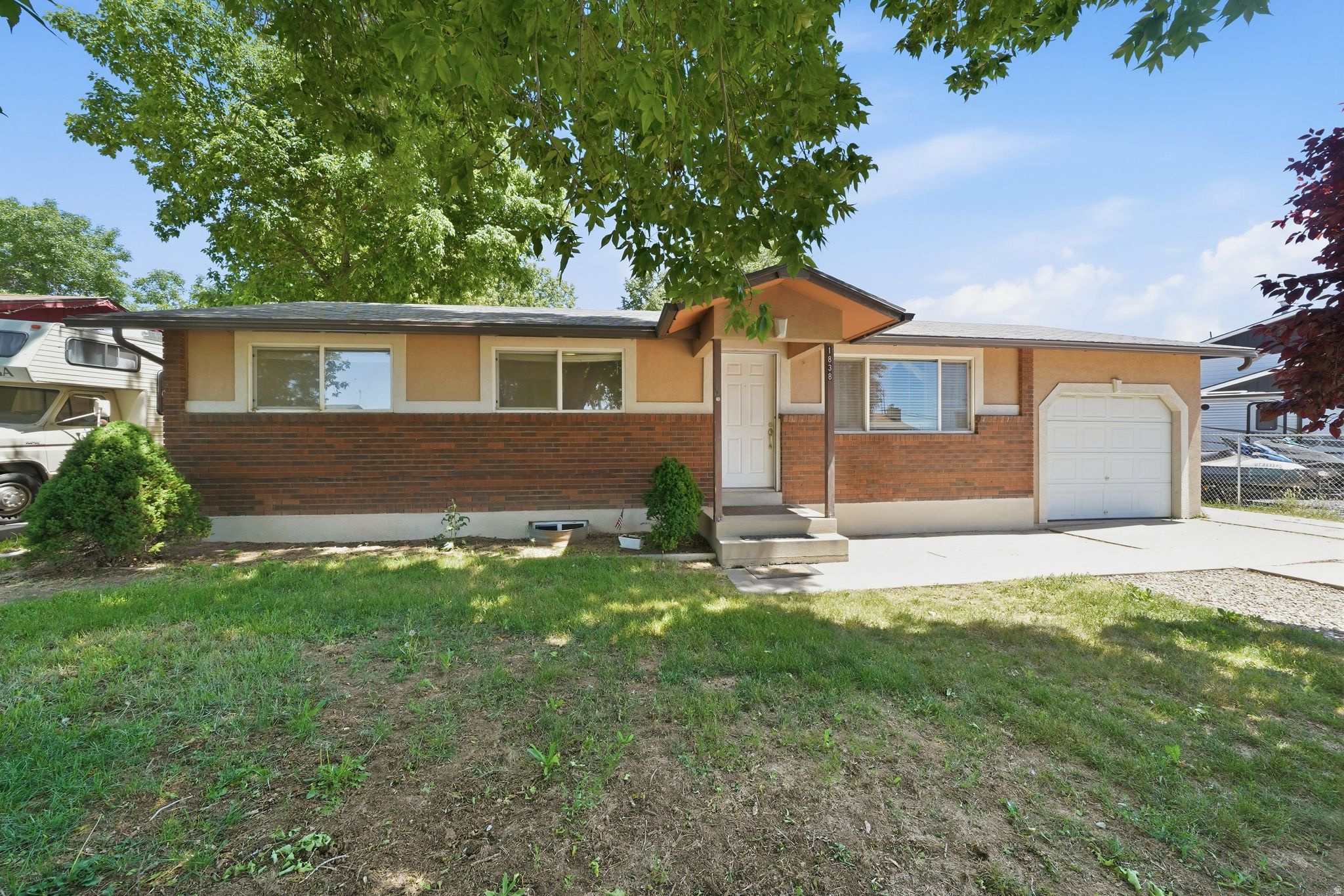 This move-in ready Layton home features 5 bedrooms, 2 full bathrooms, RV parking, and an updated kitchen. Functional layout with plenty of living space and a fully fenced backyard with room for storage, entertaining, or outdoor use. Conveniently located near Antelope Drive, I-15 access, shopping, restaurants, and Hill Air Force Base. Great value at this price point.   Square footage figures are provided as a courtesy estimate only and were obtained from County Records. Buyer is advised to obtain an independent measurement.