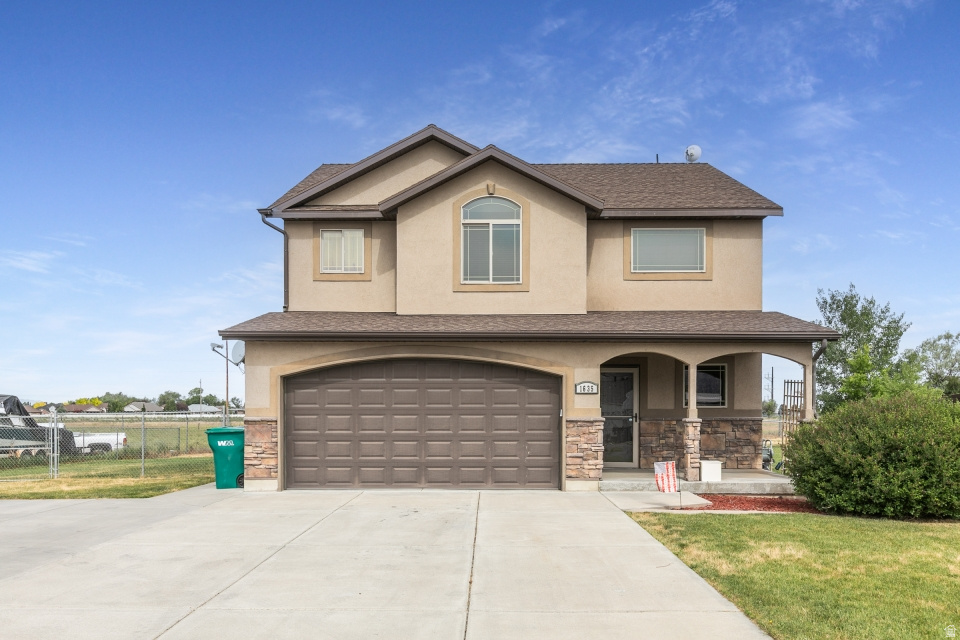 **OPEN HOUSE SAT, JUNE 13th 11-1pm** Welcome to this awesome 3-bedroom, 2.5-bath, 2 car garage home. Inside, you'll find a bright and inviting floor plan with laminate flooring throughout the main level, granite countertops, lots of pantry space and a corner stone gas fireplace with plenty of room for gathering, relaxing, and making memories in the large great room. Mozy on up the oversized stairway to your large master suite with double sinks, separate tub/shower and walk-in closet. Two more bedrooms with a jack-n-jill bathroom and laundry conveniently located next to all the bedrooms and BONUS the washer and dryer are included. Step outside to your huge .36ac, fully fenced backyard that is perfect for kids, pets, gardening, summer BBQs, or simply enjoying your own private outdoor retreat. Need parking? You'll love the abundance of space for oversized vehicles, trailers or just extra parking. Conveniently located in a desirable Harrisville neighborhood near parks, schools, shopping, and dining, this home combines small-town charm with everyday convenience. Opportunities like this don't come around often-come see why you'll want to call this Harrisville gem home!