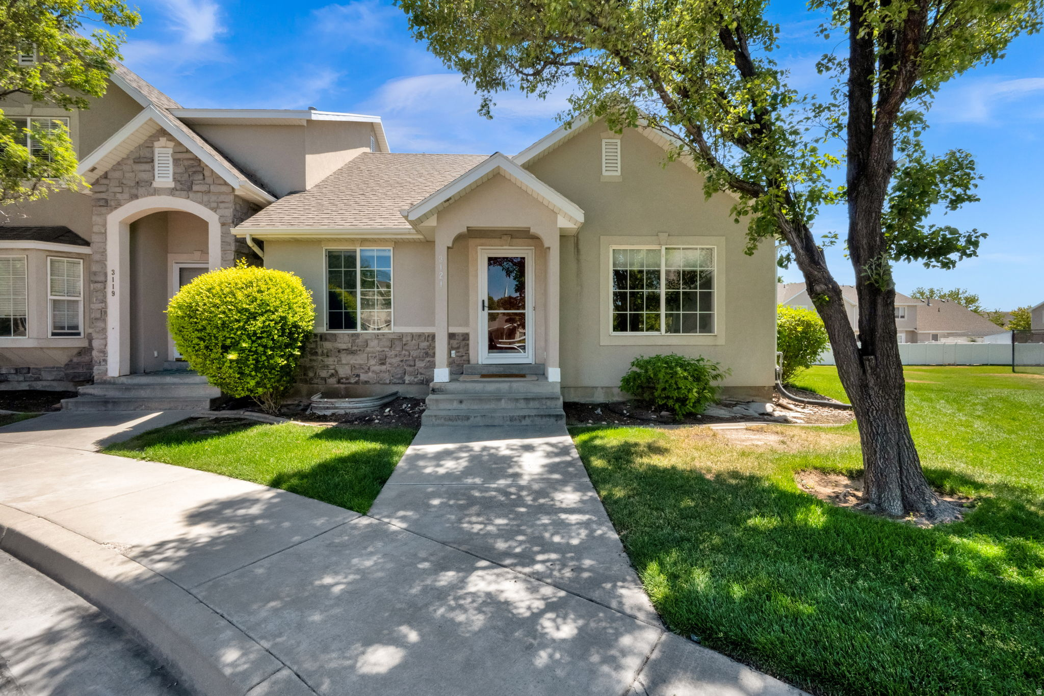 Welcome to this bright and inviting end-unit townhome in the heart of Lehi. Ideally located just minutes from Thanksgiving Point, Traverse Mountain, Silicon Slopes, shopping, dining, and quick I-15 access, this home offers the convenience today's buyers are looking for. Inside, you'll love the abundance of natural light and soaring vaulted ceilings that create an open, airy feel throughout the main living spaces. With 4 bedrooms, 3 bathrooms, a functional layout, and a community playground nearby, this home is the perfect blend of comfort, location, and value in one of Utah's fastest-growing communities.