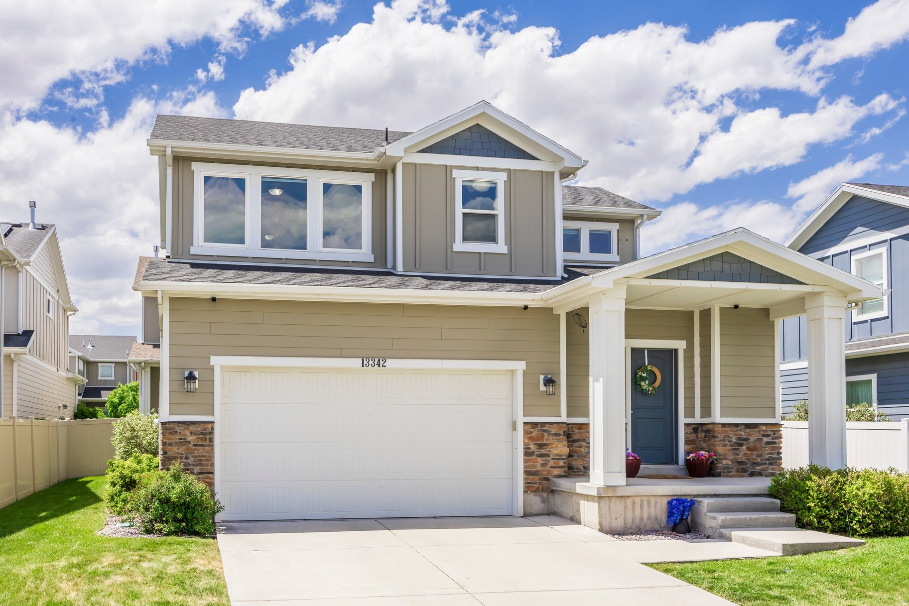 This two-story home sits right in the middle of Herriman Town Center, one of the most walkable spots on the southwest side of the valley. It's fully finished top to bottom, so there's real space to live, host, and grow into. Fresh new carpet runs throughout the home, and the kitchen has been updated with painted cabinets and a tile backsplash that adds character without going overboard. Upstairs, the primary suite overlooks the mountains and includes a walk-in closet and an ensuite bath. One of the secondary bedrooms also has its own walk-in closet - handy for kids, guests, or a home office. The location is what people move to Herriman for. You can walk to local shops, restaurants, and cafs, and Mountain View Village is just minutes away for bigger shopping trips. Mountain View Corridor is right there too, which makes the commute north toward Salt Lake City or south to Lehi about as easy as it gets in this part of the valley. Priced to move and showing beautifully - at this number, in this location, it won't be on the market long. Schedule your showing before someone else beats you to it.