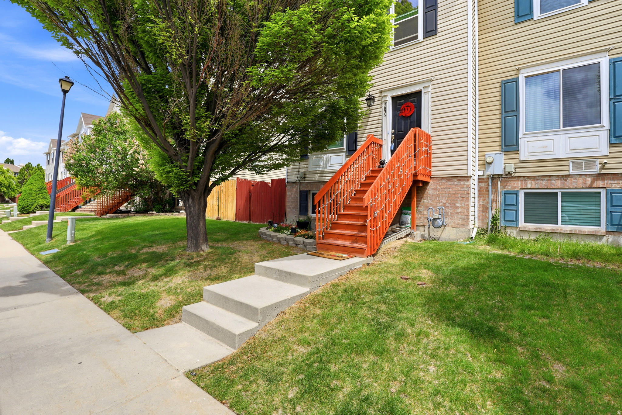 Tucked away from the main road in a quiet, established community, this thoughtfully upgraded townhome offers the kind of everyday comfort and rare amenities that are genuinely hard to find at this price point. With approximately 1,700 square feet of well-appointed living space, the home has been outfitted with premium upgrades already done for you - including an on-demand water heater and a high-capacity Evolve 44K water softener, delivering soft, clean water the moment you turn on the tap. Every window in the home, including the sliding glass door, has been replaced by All Side Window Company and carries a lifetime warranty - a detail that delivers lasting peace of mind long after closing. Inside, countertops with a granite-looking finish and stainless steel appliances make the kitchen move-in ready from day one. Step outside to a private backyard retreat featuring mature trees, and a storage shed included in the sale - a functional and peaceful outdoor space that is increasingly rare in townhome living. The community itself is a true standout. A serene community pond, fruit trees, mature landscaping, and two playgrounds create an environment that feels established and welcoming. The HOA covers water, sewer, front yard maintenance, and snow removal - so your winters are genuinely low maintenance. RV parking is also available for those who need it. All of this just minutes from shopping centers and local dining, yet set quietly off the main road where the pace slows down the moment you arrive. The upgrades are done. The details are there. This one is ready for you.