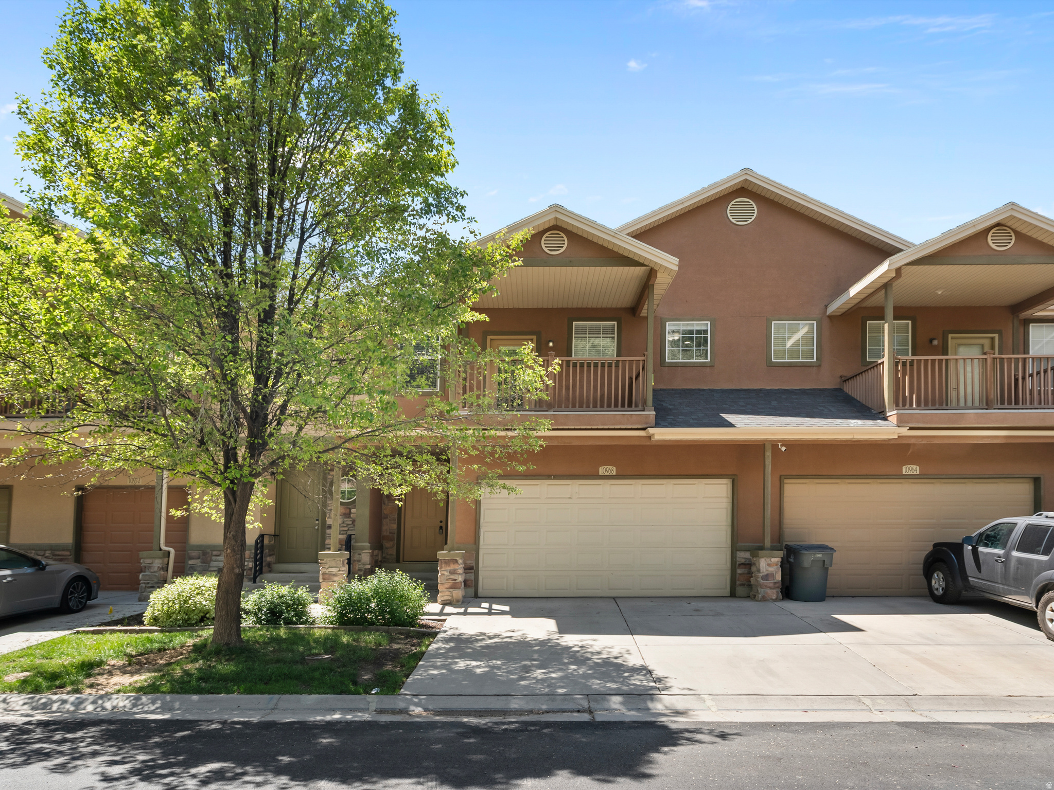 Amazing location for this South Jordan townhome in gated community.  This 4 bedrooms 3.5 bathroom homes is turn key and ready for its next family.  Fresh paint, tile floors, newer carpets, white cabinets and granite countertops.  Basement is fully finished with large family room. 1 bedroom, full bathroom, separate laundry hookups and separate entrance.