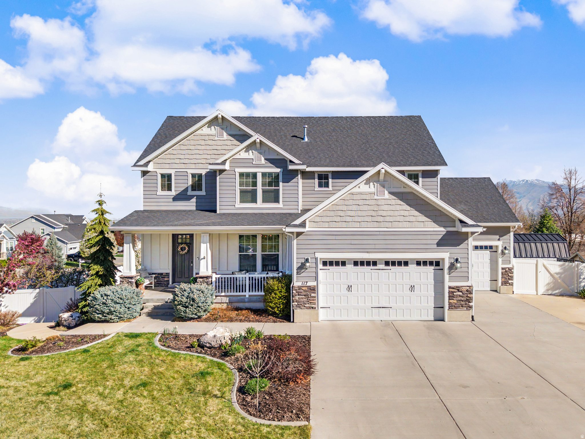 Perched in the quiet hills of Elk Ridge, this home captures breathtaking views stretching across Utah Valley with Mount Timpanogos standing prominently in the distance. The setting feels peaceful and tucked away, with a secluded yard that offers both privacy and space to enjoy the outdoors.  One of the most unique features of the home is the dedicated salon space in the basement with its own private exterior entrance. Whether you're running a business from home, creating a studio, or simply wanting a separate workspace, the setup offers exceptional flexibility without bringing clients or guests through the main living areas.  Upstairs, thoughtful custom touches continue with a built-in Murphy bed that maximizes functionality while maintaining a clean, well-designed space for guests or flexible living.  The property is designed for lifestyle as much as everyday living. There is space for RV parking, a large chicken run for those interested in hobby farming, and a backyard storage shed that keeps tools and equipment organized without taking away from the yard itself.  Living in Elk Ridge means being surrounded by nature while still staying connected. With quick access to Spanish Fork Canyon, Payson Canyon, and nearby trail systems, outdoor adventure is always close to home. At the same time, the home sits in a quiet neighborhood where the views, fresh air, and slower pace are part of everyday life.  Square footage figures are provided as a courtesy estimate only. Buyer is advised to obtain an independent measurement.