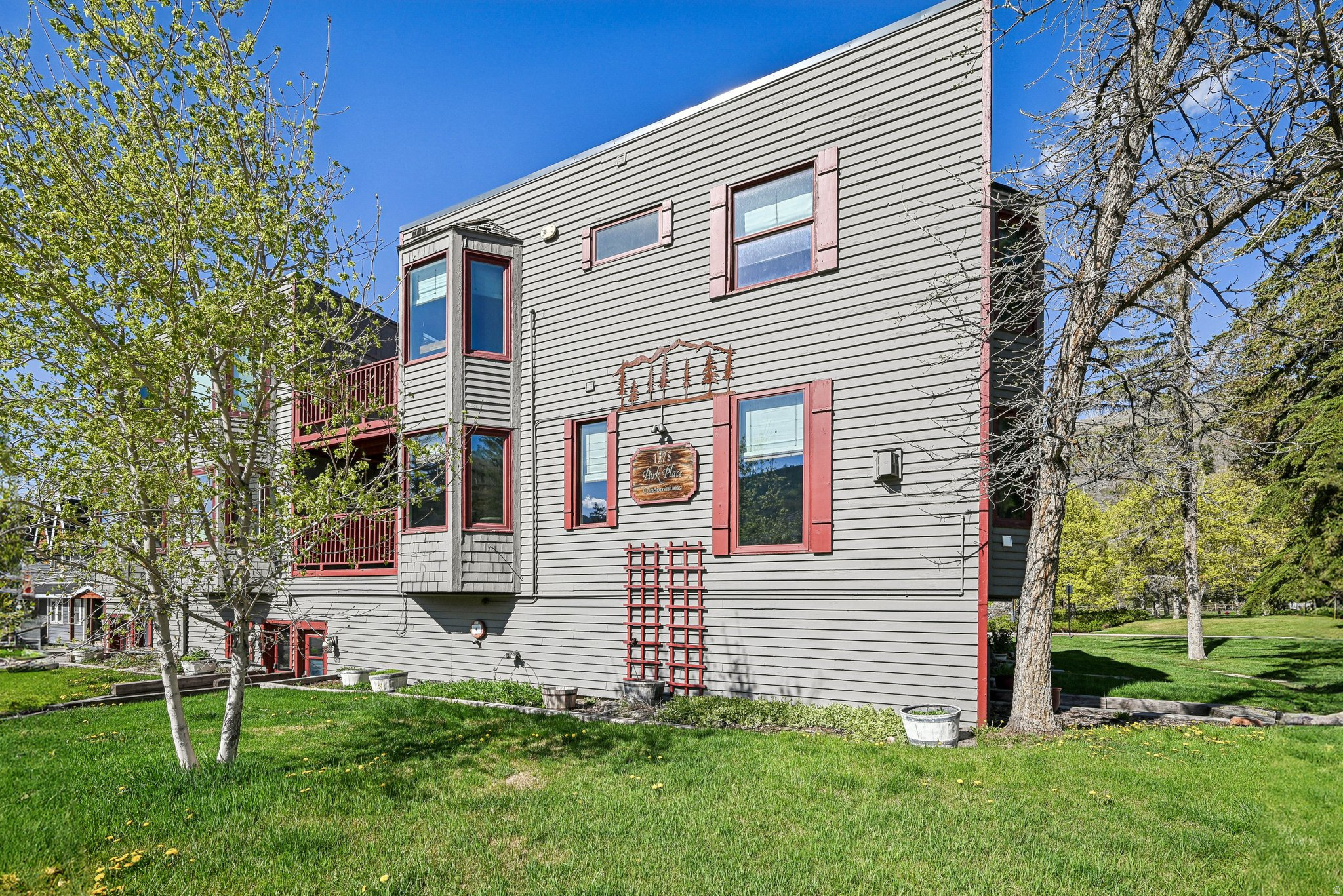 Two adjoining Park Place units are available creating the potential for a five-bedroom condo or rental property in the heart of Old Town (Unit 3 MLS # 12601801). Park Place unit #4 is a spacious 3-bedroom townhome at an incredible location in the heart of Park City. It sits adjacent to the historic Miners Hospital at the entrance to City Park, home to grassy, dog-friendly fields, tennis & basketball courts, a playground, sand volleyball courts, and a skate park. Enjoy walkability to Historic Main Street, slopes of Park City Mountain Resort, bike/hike trails, shopping, dining, and events, plus direct access to Park City's free transit route for easy transportation year-round. The home features beautiful ski resort views and is part of a small, well-maintained community of just eight residences. Owners and guests share access to a spacious deck with a large hot tub, perfect for aprs-ski relaxation or summer evenings. Inside, the traditional layout includes defined living areas and timeless, well-kept finishes. A semi-private in-unit sauna adds a cozy and desirable amenity, ideal for unwinding after a day on the mountain. Additional highlights include generous storage space and TWO dedicated parking spots in a secure community garage. This property is in a premier spot along Park City's popular Fourth of July Parade route, it is an exceptional opportunity for short-term rental income, a seasonal retreat, or long-term family asset.