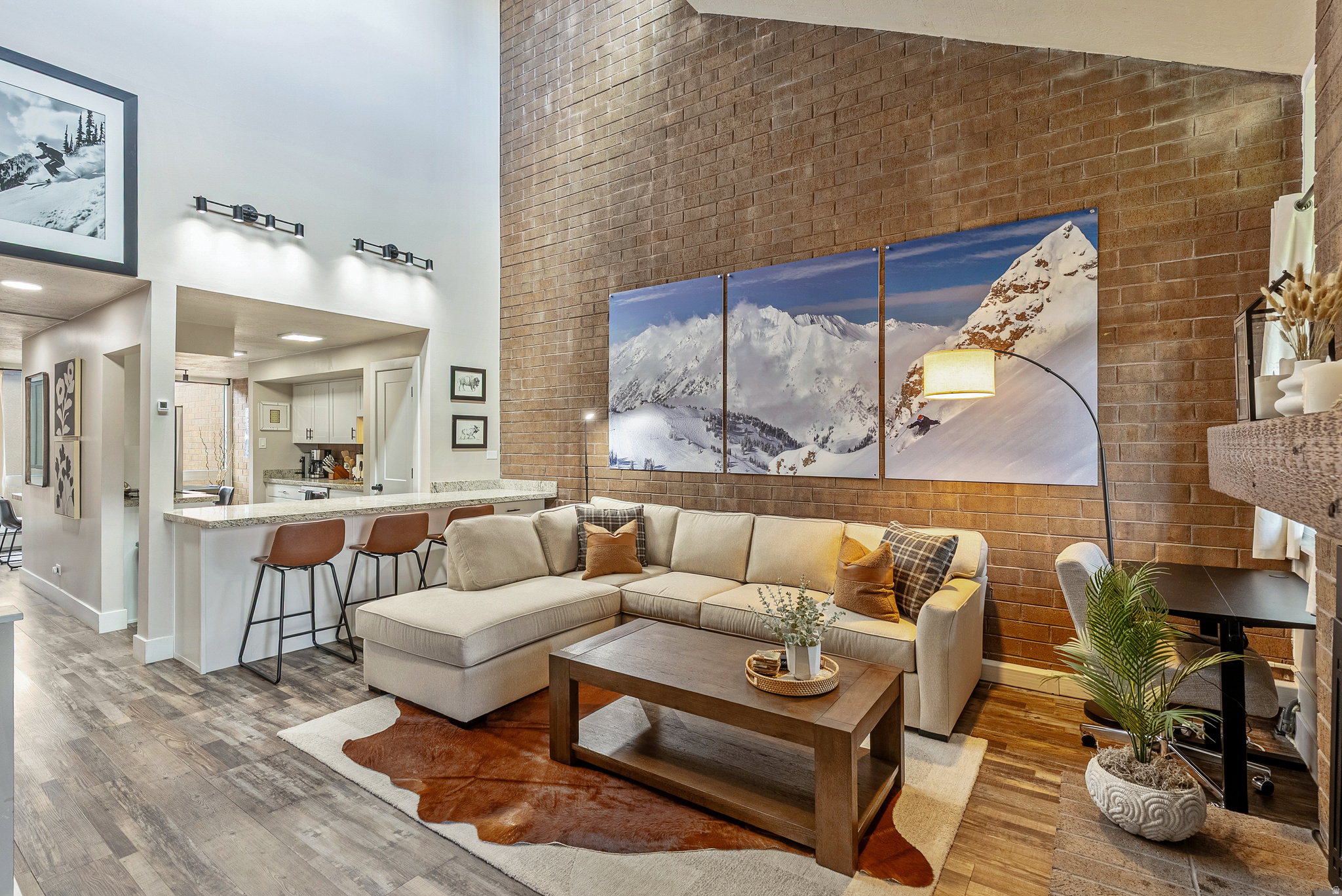 Beautifully remodeled in 2023, with additional upgrades completed in 2025, this thoughtfully designed mountain retreat combines modern luxury with exceptional comfort. Enjoy all-new furniture, premium linens and towels, a new air conditioning system, and a whole-home water softener for an elevated stay.  Ideally located at the base of Park City Mountain Resort, you're just steps from world-class skiing, championship golf, hiking and biking trails, and Historic Main Street. Whether you're here for adventure or relaxation, this stylish condo offers the perfect home base with stunning mountain views and outstanding resort-style amenities.  Discover the ultimate mountain retreat in this stylish, cozy condo nestled at the base of Park City Mountain Resort, steps away from skiing, golfing, and Main Street. Designed for comfort, privacy, and convenience, this elegantly appointed home offers spacious accommodations, mountain views, and resort-style amenities-including two hot tubs, a pool, and covered parking. Whether you seek adventure or relaxation, this exceptional condo promises an unforgettable getaway in the heart of Park City.  Dedicated covered parking spot and an uncovered spot behind it, located at the entrance to the condo. Additional uncovered guest parking spots located within the condo complex. The complex takes meticulous care of snow removal during the winter months. Brand new sleeper sofa with a comfortable memory foam mattress Whole-home water softener 3 sets of Premium, hotel-quality linens and towels Gas fireplace in the living room Central air conditioning Three smart TVs Full-size washer and dryer Dishwasher with supplies included Fully equipped gourmet kitchen Dedicated ski and bike storage Oversized, serene community hot tubs and a pool with direct views of the golf course and Park City Mountain Condo layout: the two bedrooms are situated at opposite ends of the unit, offering privacy and space. Each bedroom features mountain views, an en-suite bathroom and fireplace. Oversized, upstairs bedroom includes a king bed. Main level bedroom includes a private balcony, a brand new custom built king bunk bed, mini-fridge, glasses, dishes, utensils and microwave. The upstairs primary bedroom is separated from other sleeping areas. Parents can evaluate whether this arrangement is suitable for their children. In the living room, you will have a brand new sleeper sofa with a comfortable memory foam mattress.