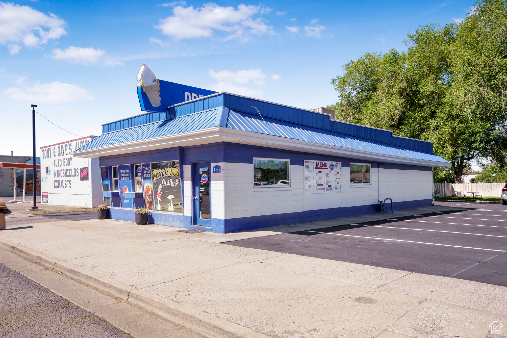 Don't miss your chance to own a profitable drive-in on bustling Beavers Main Street! This thriving establishment offers a fully updated building equipped with top-of-the-line fixtures, including three high-capacity ice cream machines and a brand-new grill-perfect for serving your customers quickly and efficiently. Enjoy convenient paved parking and accessible drive/walk-up windows for customer ease. The inviting dining area, outdoor tables, and ample storage container make it easy to accommodate guests year-round. With restrooms and prime Main Street frontage, this location is primed for visibility and success.