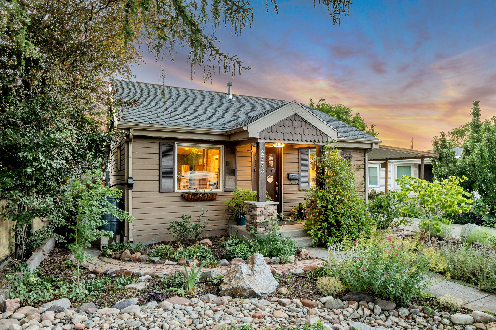 Charming cottage on a quiet street. You'll love the private backyard with a covered patio, the mature fruit trees, and plenty of space. The house has solar panels and a car charger. Inside, you'll love the granite counters, vaulted ceiling, loft area and master bathroom. The electrical and plumbing have been updated and the home has been very well maintained.