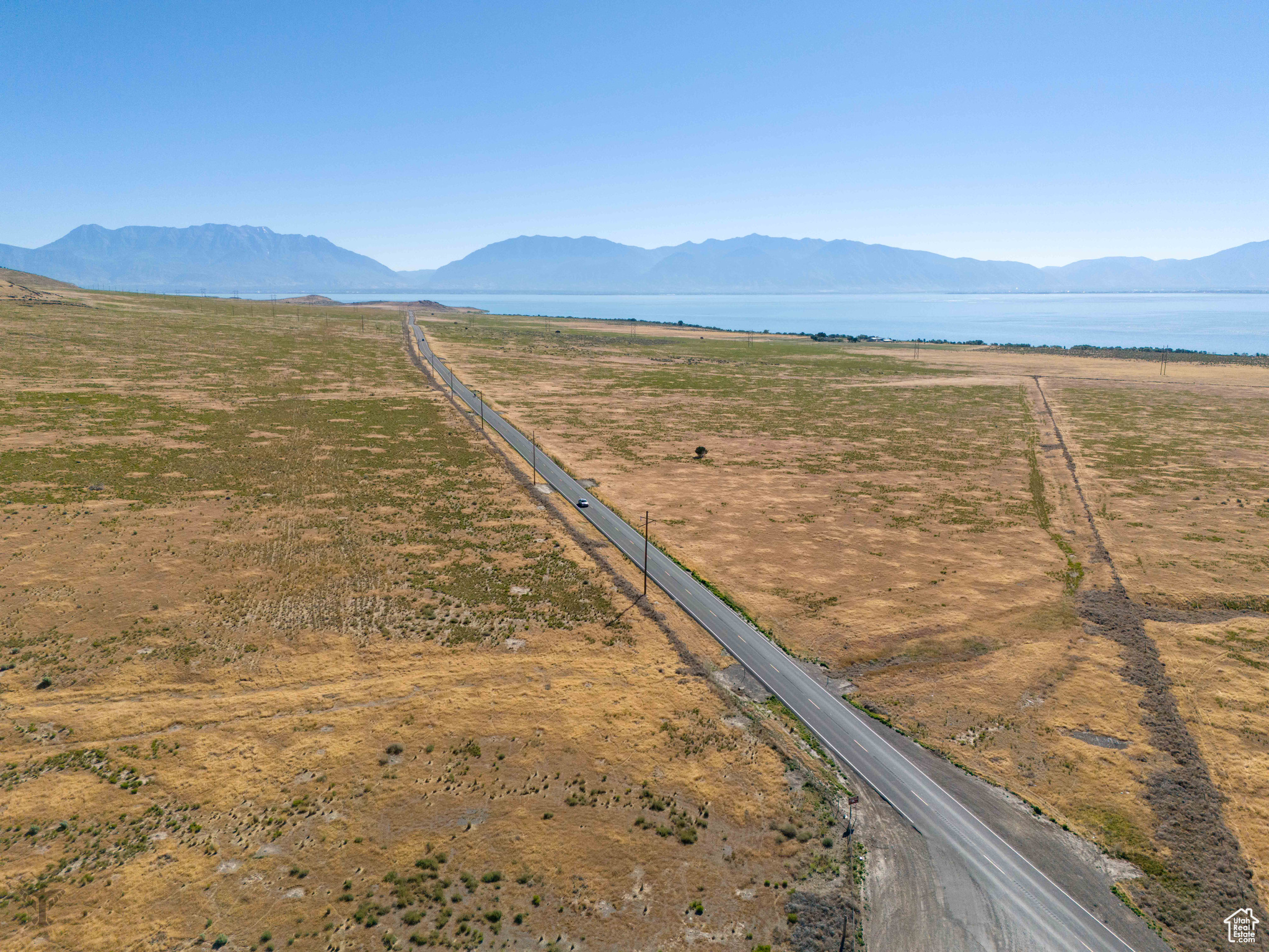 We're back on the market due to buyer complications.  Just 10 miles south of Saratoga Springs lies this 70 acre parcel with gorgeous lake and mountain views. Highway 68/Redwood Road runs right through it, boasting an incredible 1600  feet of road frontage on the west side and 1700 feet on the east side of HWY 68! With the gradual slope, the lake is within view on almost every part of the property.  The southwest corner of the two parcels is the easiest to find. It is near the Soldier's Pass connection on HWY 68. There are already electrical lines running along the road. There is a well located on the property, but it has not been used in the 22 years the seller has owned the property, nor does the seller possess water or mineral rights. The well may need to be drilled again, but water should be very easy to find.