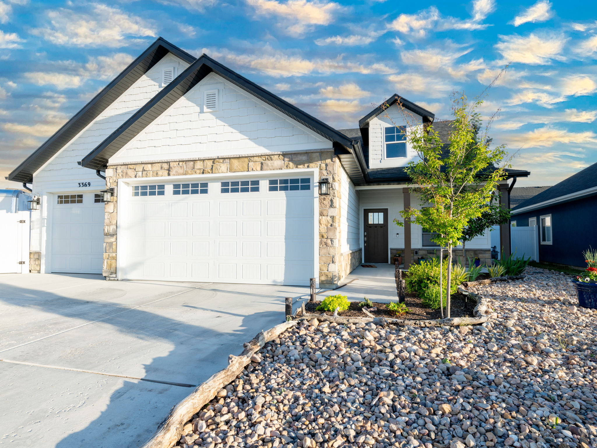 **PRICE IMPROVEMENT!!** Tucked away in a peaceful cul-de-sac, this stunning 2022-built home in West Haven is exactly what today's buyers are searching for. Showcasing a bright, open-concept design, the main living area seamlessly connects to a beautifully appointed kitchen featuring modern finishes, sleek cabinetry making it truly move-in ready and ideal for both everyday living and entertaining.  Natural light pours in throughout the home, highlighting its fresh, contemporary style and thoughtfully designed layout. Step outside to enjoy a fully fenced yard, perfect for relaxing, pets, or gatherings. The property also offers a rare combination of a 3-car garage plus dedicated RV parking, providing ample space for vehicles, toys, and storage.  This home blends comfort, functionality, and style in a desirable location-don't miss the opportunity to make it yours.