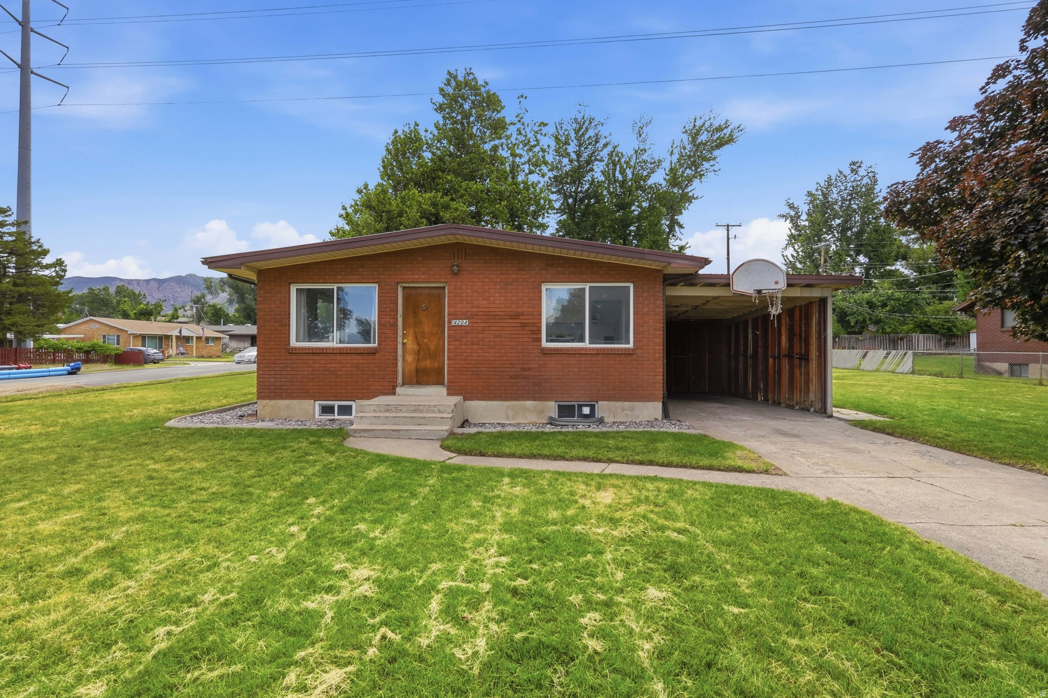 Investor alert or house hack opportunity right next to the Ogden Country Club. This duplex puts two 3-bed/1-bath units under one roof with real upside built in. One side has been freshly updated with new carpet and paint and is move-in ready. The basement offers unfinished space with room to add a bathroom and bedroom or family room. The second unit is currently occupied and vacates August 1st, giving you a clean transition into full ownership. Both sides have brand new furnaces from June 2026. Live in one side, rent the other, and let your tenant cover a chunk of your mortgage. Or hold both units as a straight rental play. Either way, this one pencils.