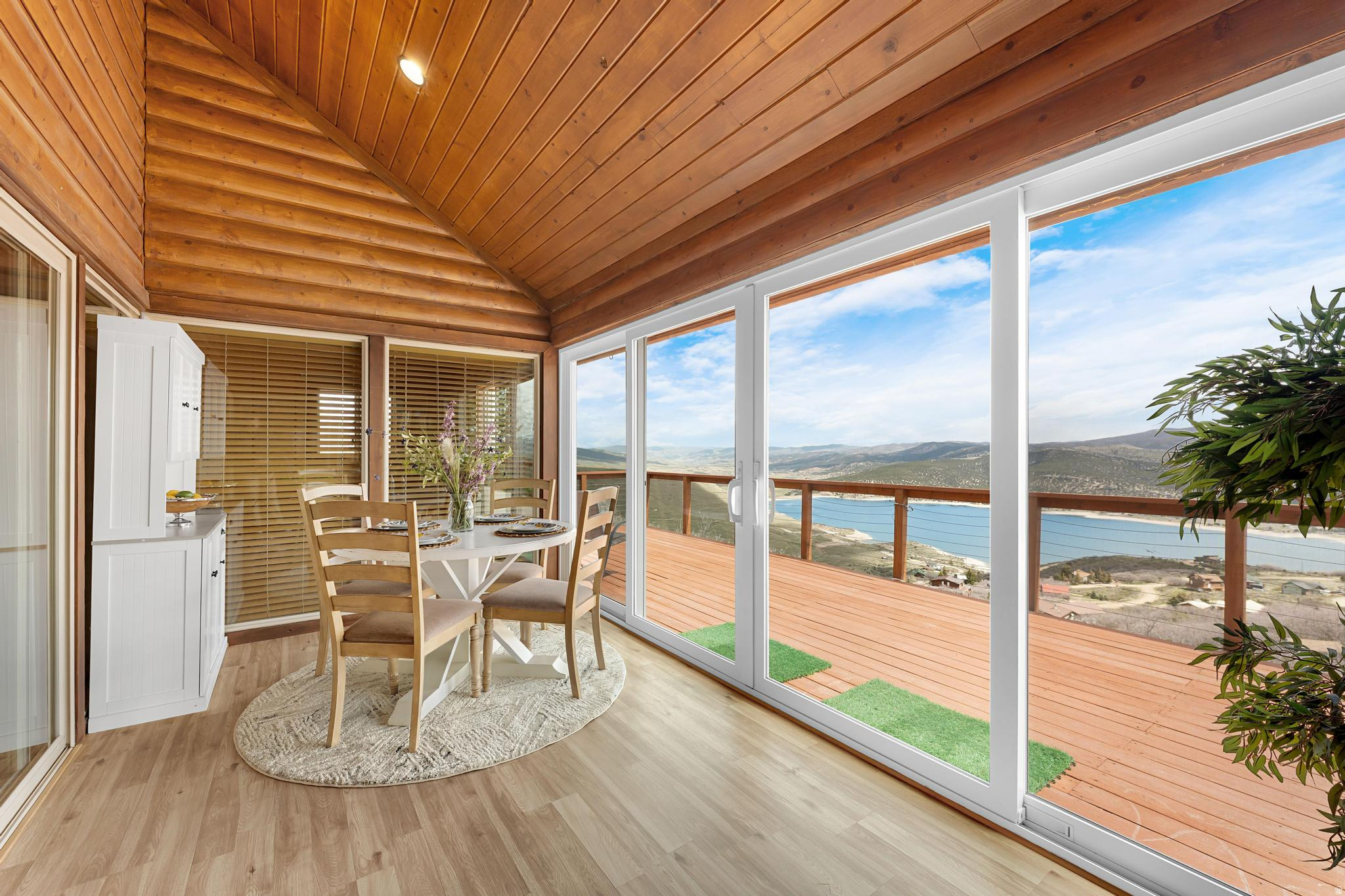 Escape to your own mountain retreat with breathtaking views of Rockport Reservoir and the surrounding mountains. Whether you're looking for a full-time residence, weekend getaway, or vacation home, this beautifully remodeled cabin offers the perfect blend of comfort, privacy, and adventure. Imagine starting your mornings with a cup of coffee on the expansive wrap-around deck, spending your afternoons boating, fishing, hiking, or exploring nearby trails, and ending your evenings watching unforgettable sunsets beneath a sky full of stars. Located just minutes from Rockport Reservoir and approximately 30 minutes from Park City, you'll enjoy year-round recreation while still being within easy reach of world-class skiing, dining, shopping, and entertainment. Inside, you'll find a thoughtfully updated interior featuring an open-concept living area, a stunning sunroom filled with natural light, and numerous upgrades that allow you to move right in and start making memories. Every improvement has been carefully completed to enhance both comfort and functionality while preserving the warmth and character of this mountain retreat. Whether you're hosting family and friends, escaping the hustle and bustle of city life, or simply enjoying the peace and quiet of the mountains, this property offers the lifestyle you've been dreaming of. Don't miss this rare opportunity to own a beautifully updated mountain retreat in one of Utah's most sought-after recreational areas.
