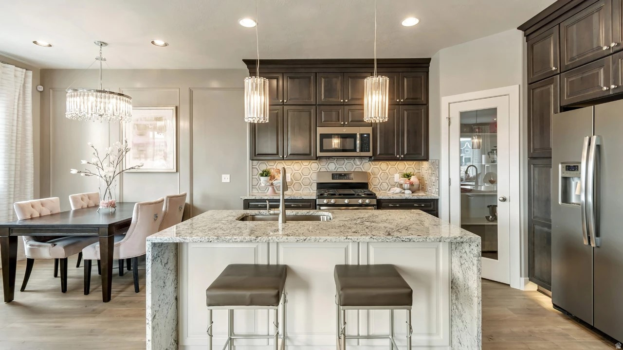 Welcome home to the Buchanan plan by Woodside Homes. This highly sought after community is close to everything you'll need. Front Runner, I15, shopping, restaurants, walking/biking trails, & more are just minutes from your door. The Buchanan plan is an END unit with tons of windows for added natural light, 9' ceilings on the main floor, inviting layout with wood laminate flooring, stainless kitchen appliances, tile in the baths, 2-tone paint, tankless/on-demand hot water & so much more. This floorplan is a DOUBLE master perfect for roommates, sisters or baby nursery! Home will be completed in NOVEMBER hurry you can still choose your own design finishes! Don't miss out on the opportunity to love where you live in Meadowbrook. **Photos are of decorated model home-upgrades/finishes/pricing will vary** Don't forget to ask about our awesome preferred lender incentives (rates as low as 3.75%!) to help make your dreams of home ownership a reality. #475 Buchanan. Visit the 6 decorated model homes at 853 West 560 South in American Fork
