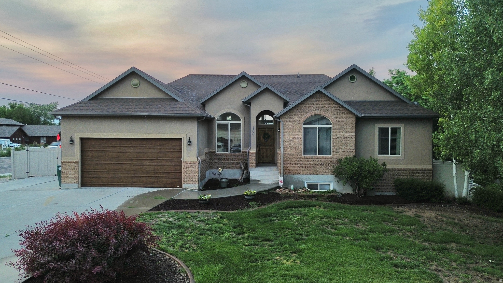 Beautiful home in a highly desired location! Featuring a very inviting main living area. You will enjoy open concept living with vaulted cielings, and a cozy fireplace. Awesome windows that allow for natural light, and barnwood style plank flooring. The home has 6 big bedrooms, and 3 full baths. The master bedroom is a retreat. Enjoy your En Suite with a jetted tub, huge walk in shower and walk in closet. Big living areas with plenty of room for get togethers. The outside also features a deck, and a 20x20 patio area great for entertaining, for enjoying sunrises and sunsets, as well as a view of the mountains. Enjoy a 20x30 metal building with a garage door, for an extra vehicle, toys, or storage. There is RV parking on the side of the house.The washer, dryer, and extra fridge in the garage are included - Unless the buyer doesn't want them, they can easily be moved. Seller's are offering 9,000.00 to concessions. The home is being sold as is - because the Sellers have moved out of state. It is Vacant, and easy to show. Contact agent for the code to get in.  Buyer to verify all info. Square footage taken from county records.