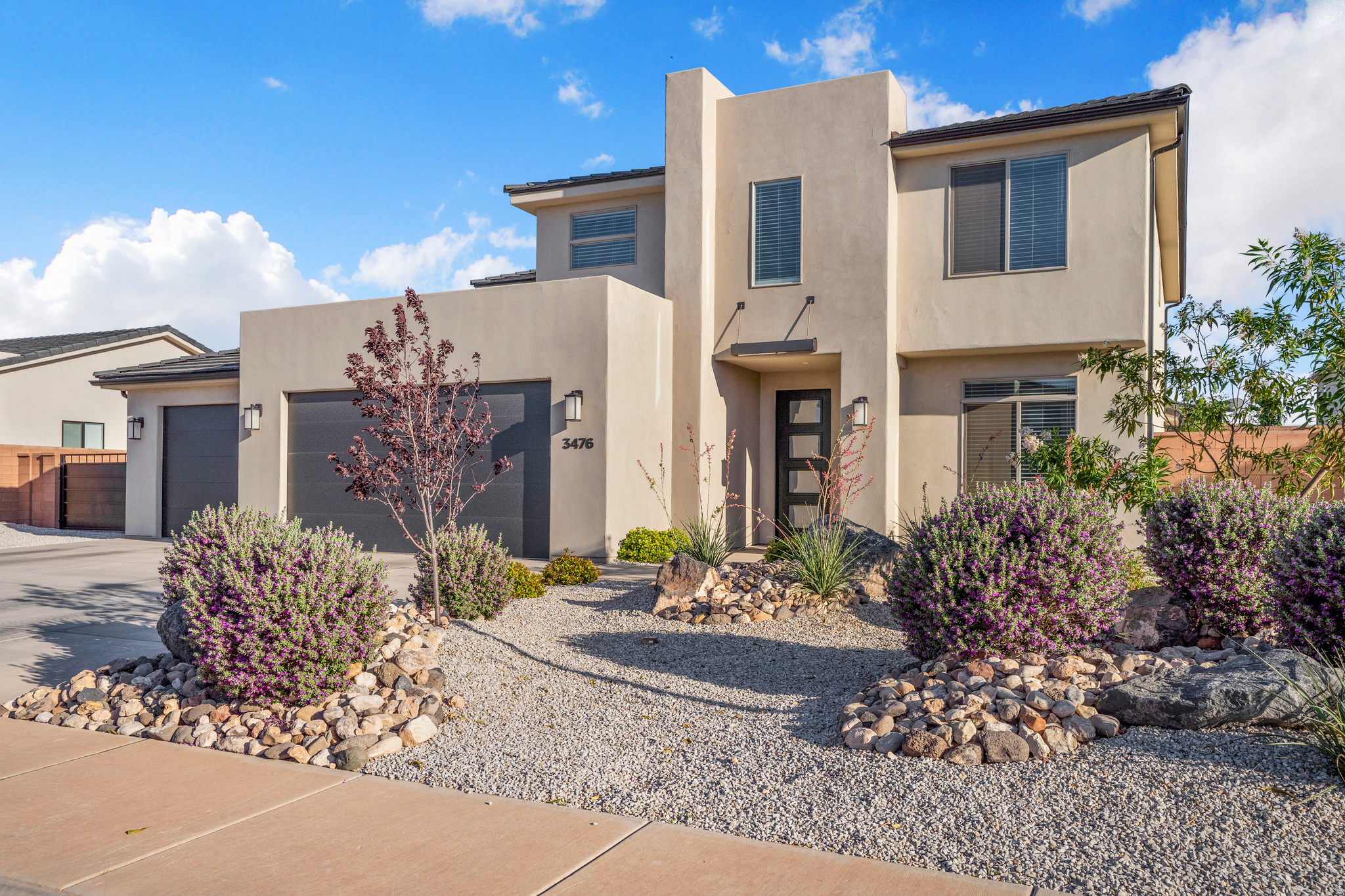 BE. BOLD. Live Bigger. Nestled in the heart of Little Valley and located within the highly sought-after Crimson Cliffs school boundaries, this beautifully maintained home offers the space, functionality, and lifestyle today's buyers are searching for. With 3,471 square feet, 6 bedrooms, 3.5 baths, a dedicated office, and two oversized gathering spaces, there's room for everyone to spread out and come together. The bright, open kitchen flows seamlessly into the main living area, while the spacious primary suite offers a peaceful retreat with a luxurious ensuite bath. Upstairs, a large second family room creates the perfect space for movie nights, game days, or a kids' retreat. Step outside to a beautifully landscaped backyard featuring low-maintenance turf, mature landscaping, and a covered patio designed for relaxing and entertaining. Need space for toys and trailers? Enjoy RV parking, a 3-car garage, and no HOA restrictions. Located in one of St. George's most desirable neighborhoods, this home combines comfort, flexibility, and exceptional value in a location that continues to be in high demand.  Looks BRAND NEW Be. Bold. Come home to Little Valley.