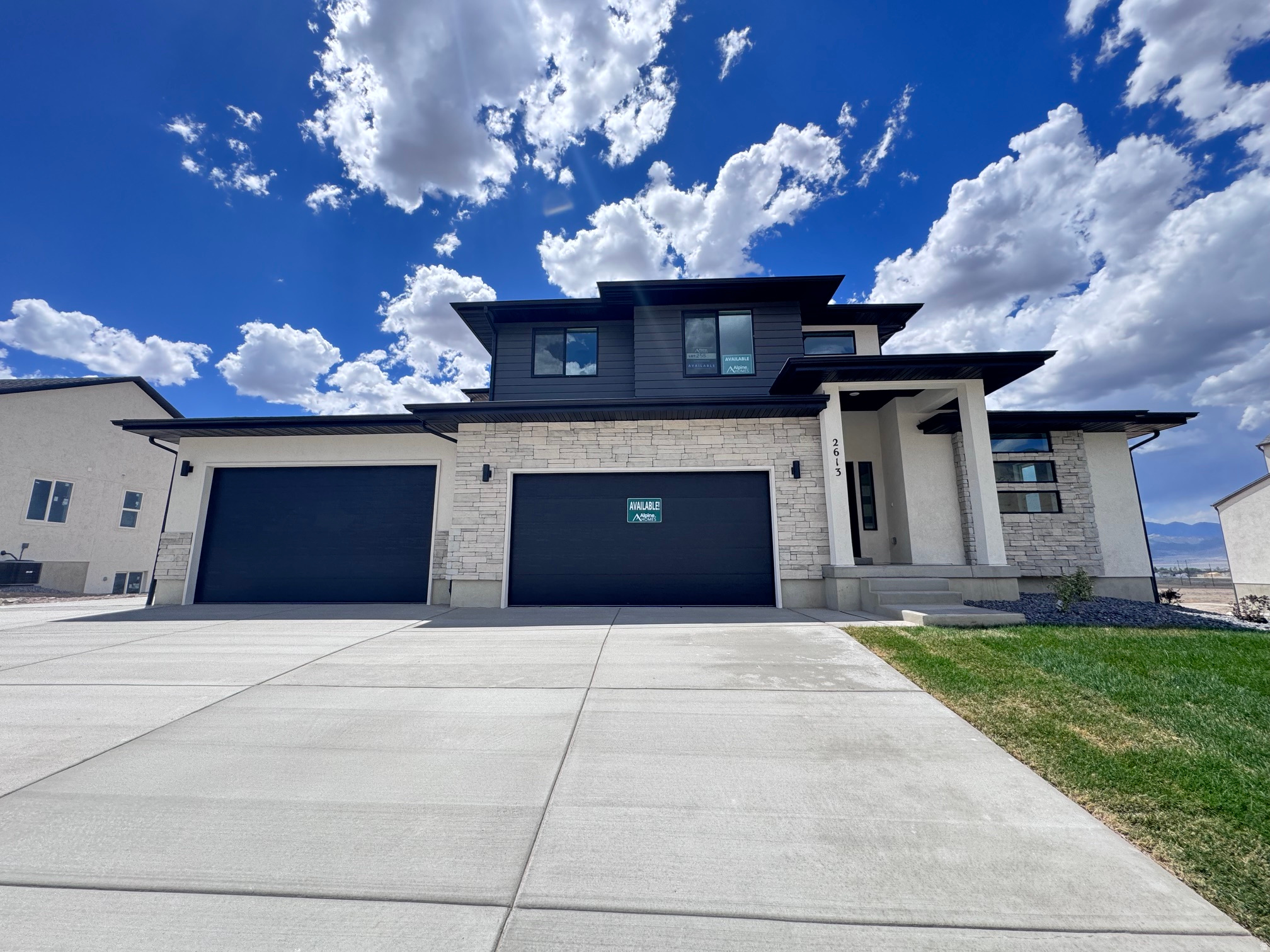 QUICK MOVE-IN! Welcome to this brand-new 'Maple' home by Alpine Homes in Eagle Mountain's highly desired Scarlet Ridge. The seller is offering up to $22,000 toward rate buydowns/closing costs plus a free RV pad! Nestled on a rare half-acre lot with a walkout basement, this home boasts 4 bedrooms, a main-floor office, a dramatic 2-story great room, and a massive 4-car garage with RV Parking. Enjoy a luxury main-floor primary suite, a quartz gourmet kitchen, and beautiful mountain views. You are perfectly positioned just 3 mins from City Center, 15 mins from premier Saratoga Springs shopping, and under 30 mins from I-15 and Lehi's Silicon Slopes!
