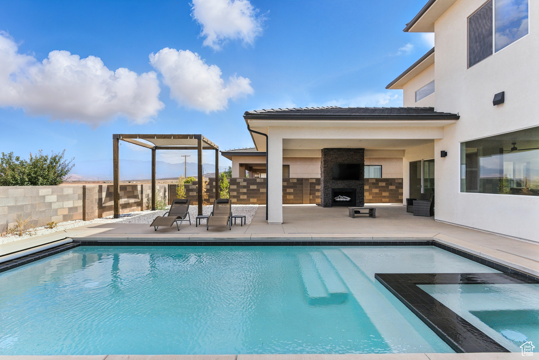 This beautiful large home provides ample space & style with its 5 bedrooms, 4.5 bathrooms & a great floor plan for easy living. Built with great attention to detail and room for all your toys in the extra-large 3 car garage.  A generous patio with outdoor fireplace provides lots of outdoor entertainment area for family and friends by the pool. New and very easy to show!