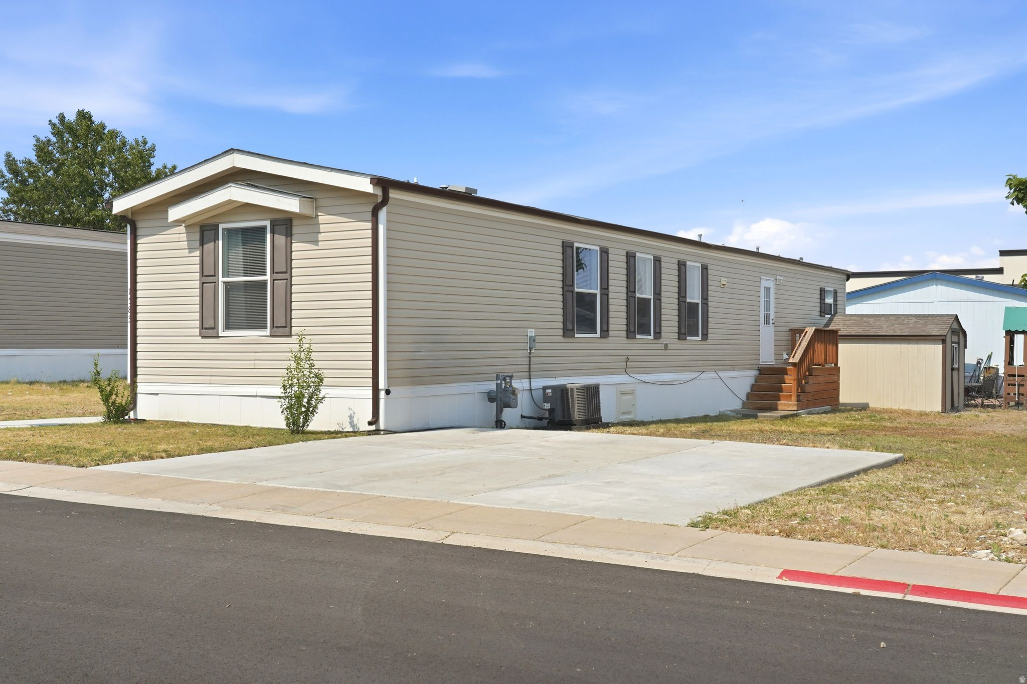 This beautifully maintained home offers an open, spacious layout with primary suite featuring a private bathroom. Move-in ready while still offering the opportunity to add your own style and updates. Located in the desirable Overpass Point community, you'll enjoy quick access to shopping, dining, and major freeway connections. Buyer must obtain park approval through www.Bayshorehomesales.com