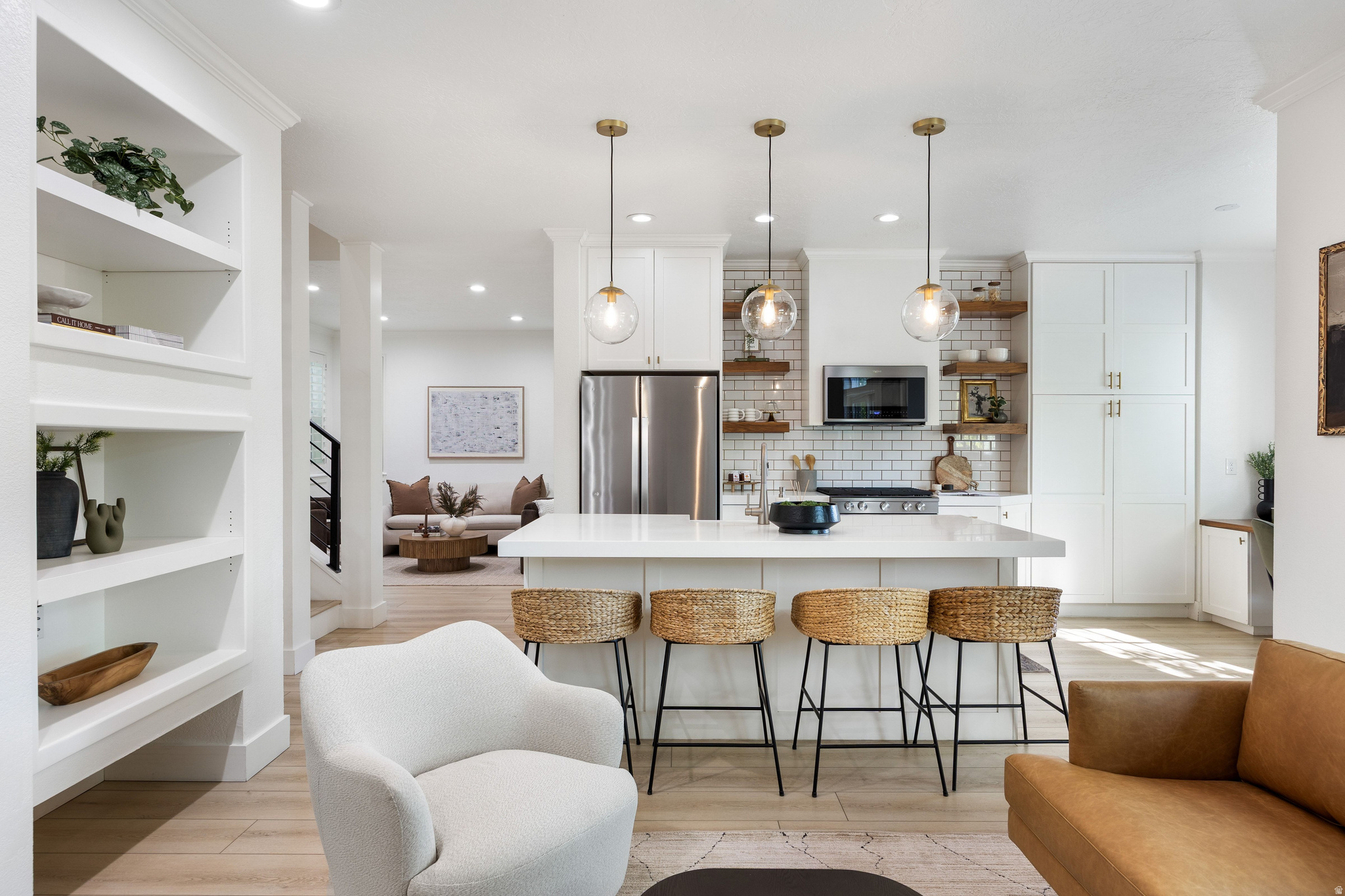 1080 Old Stone House Way is not your average remodel. Completed in 2019, every single surface was touched, every system updated, and a full en-suite bedroom with walk-in closet was added-resulting in 4 bedrooms, 3.5 bathrooms, a flexible loft, and approximately 2,500 square feet of thoughtfully designed living space. The largest floor plan in Blackhawk Station, and it shows.  The gourmet kitchen is the heart of the home. Two dishwashers, floating designer open shelving, a kitchen desk nook, and finishes that are as functional as they are beautiful. The kind of kitchen that actually gets used.  An abundance of natural light fills every room. The fenced backyard opens directly to neighborhood trails and community open space, making the outdoors feel like an extension of the home itself. Walking and biking distance to endless trails and all that Kimball Junction has to offer.
