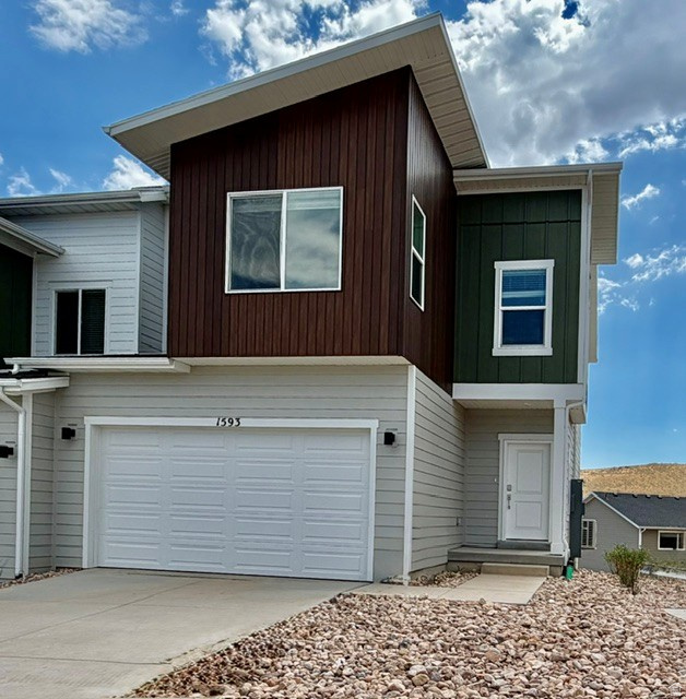 The Valley at Wildflower  3064 | Residence E.  Estimated completion in August! Receive up to $20,000 toward closing costs or ask about our special financing options when financing with our preferred lender.  Rare premium end-unit location! Enjoy no backyard neighbors with beautiful views of open space and the community park from your private deck-a peaceful setting that's hard to find.  This home offers 3 bedrooms, 2.5 bathrooms, an attached 2-car garage, and a full unfinished walkout basement. The open-concept main floor features a spacious kitchen with white craftsman-style cabinets, Miami Oro quartz countertops, stainless steel appliances (including the refrigerator), and included blinds.  Upstairs, you'll find a spacious owner's suite with a private bathroom, two additional bedrooms, a full secondary bathroom, and a convenient laundry area.  Square footage figures are provided as a courtesy estimate only and were obtained from the builder. Buyer is advised to obtain an independent measurement. Interior photos are of the same floor plan, but not the actual home. Rendering is for illustrative purposes only.