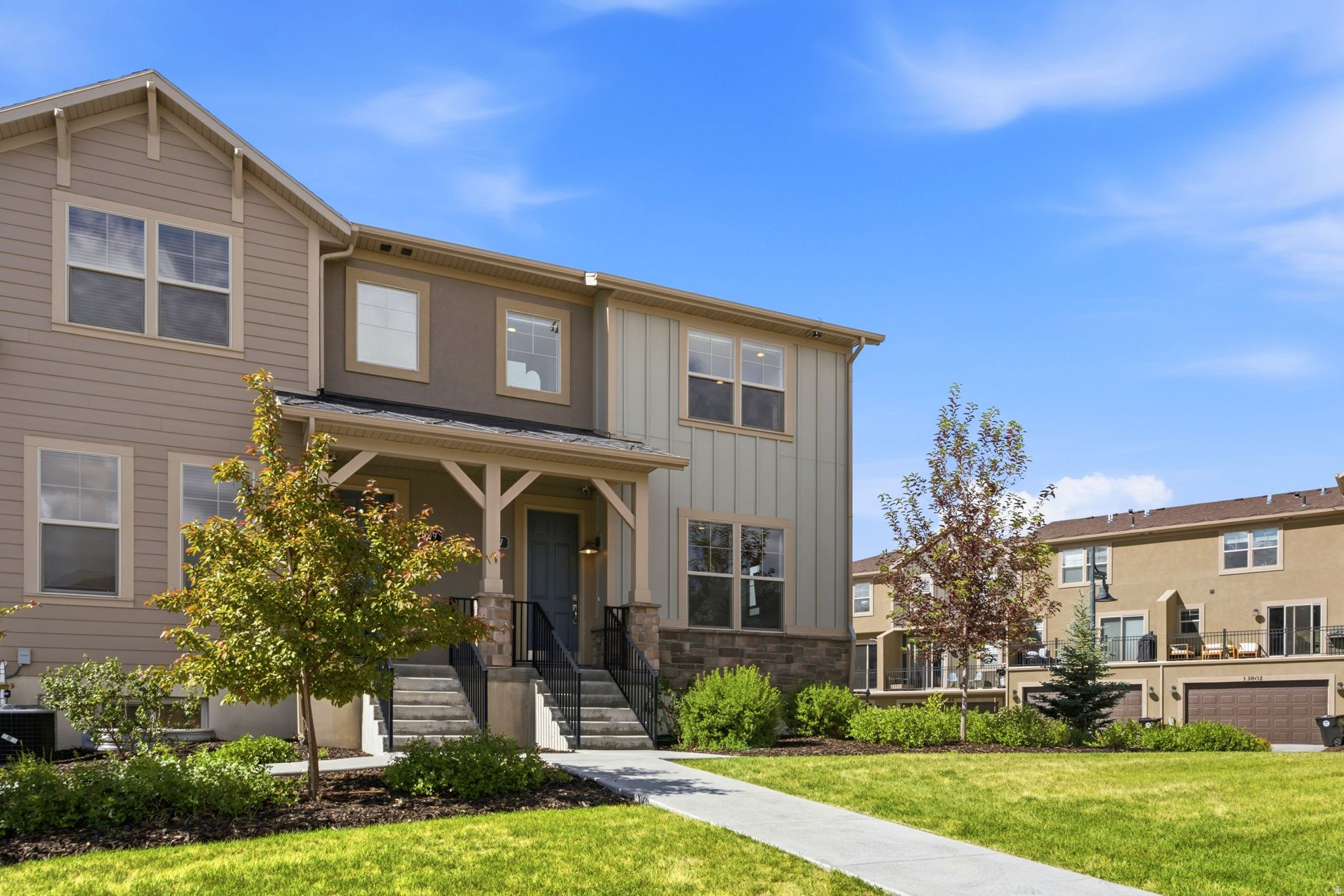 Ideally situated on a desirable end-unit location with open space alongside, this thoughtfully designed 4-bedroom townhome in Hideout's Wasatch Springs community offers the perfect blend of comfort, privacy, and convenience just minutes from Deer Valley's East Village, Jordanelle Reservoir, and historic Park City. The open-concept floorplan creates an inviting space for gathering with family and friends, featuring spacious living and dining areas that flow seamlessly into the kitchen and main living spaces.  With approximately 2,200 square feet of living space, the home offers room to spread out while maintaining a warm and functional layout. A standout feature is the upgraded fourth-bedroom lockout studio with its own private garage-level entrance, creating a level of flexibility not commonly found in comparable townhomes. Whether utilized for guests, extended family, personal use, or additional income potential, the space offers a variety of possibilities to fit changing needs and lifestyles.  Whether you're seeking a full-time residence, mountain getaway, or investment opportunity, you'll appreciate the easy access to world-class skiing, boating, hiking, biking, golf, and countless year-round recreational opportunities, all while enjoying the convenience of life in one of Hideout's most desirable communities.