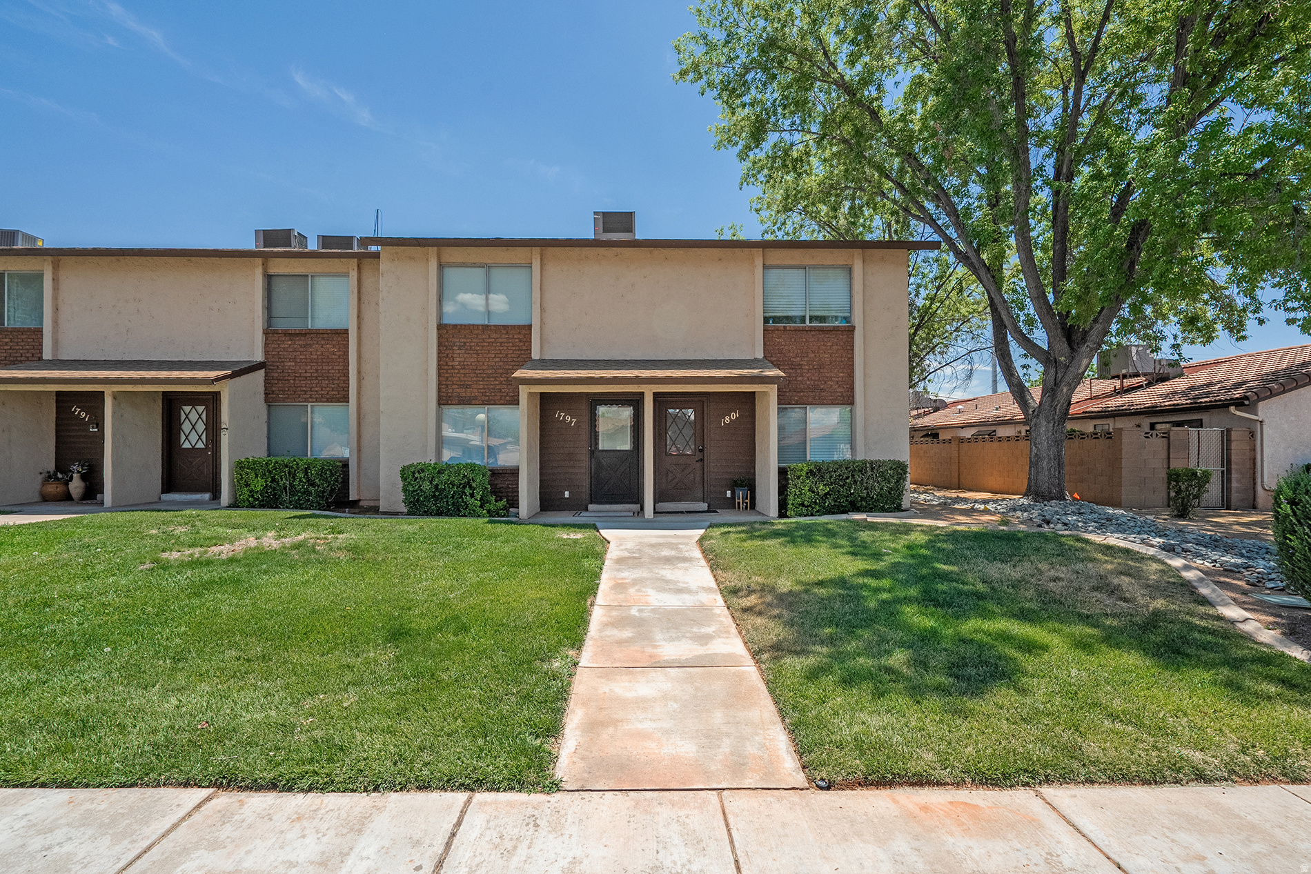 Immaculate and move-in ready! This beautifully maintained townhome offers comfortable living in the heart of St. George with a functional floor plan, abundant natural light, and low-maintenance living. Featuring new carpet and fresh paint throughout, this home feels clean, updated, and ready for its next owner. Enjoy the convenience of two covered carport parking spaces, providing protected parking and additional value.  Conveniently located near shopping, dining, parks, schools, and endless outdoor recreation, this property is perfect as a primary residence, second home, or investment property. Seller is offering $5,000 toward closing costs, rate buy downs, or other buyer-approved expenses. Don't miss this exceptional opportunity!