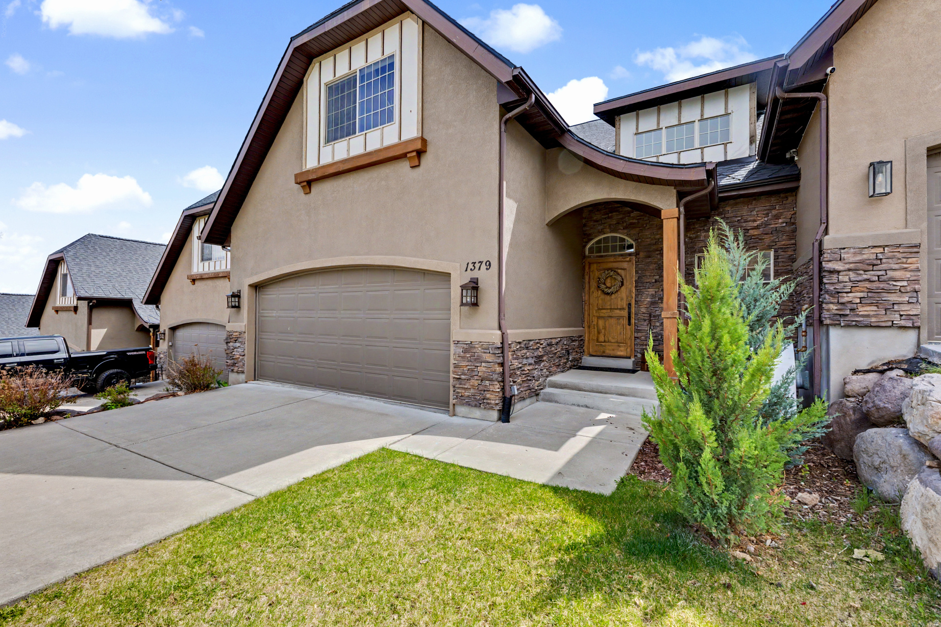 Nestled at the base of Wasatch mountains in Swiss Alpenhof subdivision.  This townhome is in pristine condition with high ceilings and large beautiful windows that allow the sunshine to light up the big open space of the first floor & the second floor loft.  Hard wood floors throughout first floor. Kitchen has granite countertops, large island with overhang on one side for quick dinning or social gathering space with seating. Great for entertaining.  Main floor is master suite with fireplace, spacious bath with his & her sinks, walk in shower and walk in closet, laundry room and 1/2 bath.  Direct access to private deck from master through double doors. Second floor is large open family room space that looks down onto main floor.  Two big bedrooms both with walk in closets and one full bath. Third floor has another large family area that could be made into a home theatre room.  Large bedroom with walk in closets and full bath.  Lots of storage space throughout this home.    Owners planted six new Cedar to create more privacy off of the front entrance and the back deck.  New roof in 2023 and two new water heaters.  Come see this home that's in immaculate shape, remodeled in 2020 with high end finishes, garage is finished with epoxy floors.  Experience the healthy lifestyle Midway has to offer.  You can easily ride your bike 10 minutes to the heart of town and enjoy a variety of restaurants, cafes and boutiques. Your just 15 minutes to Deer Valley Mayflower extension & five minutes from Wasatch State Golf course.  Owners rented out this townhome and happy to share rental figures for 2024 & 2025.