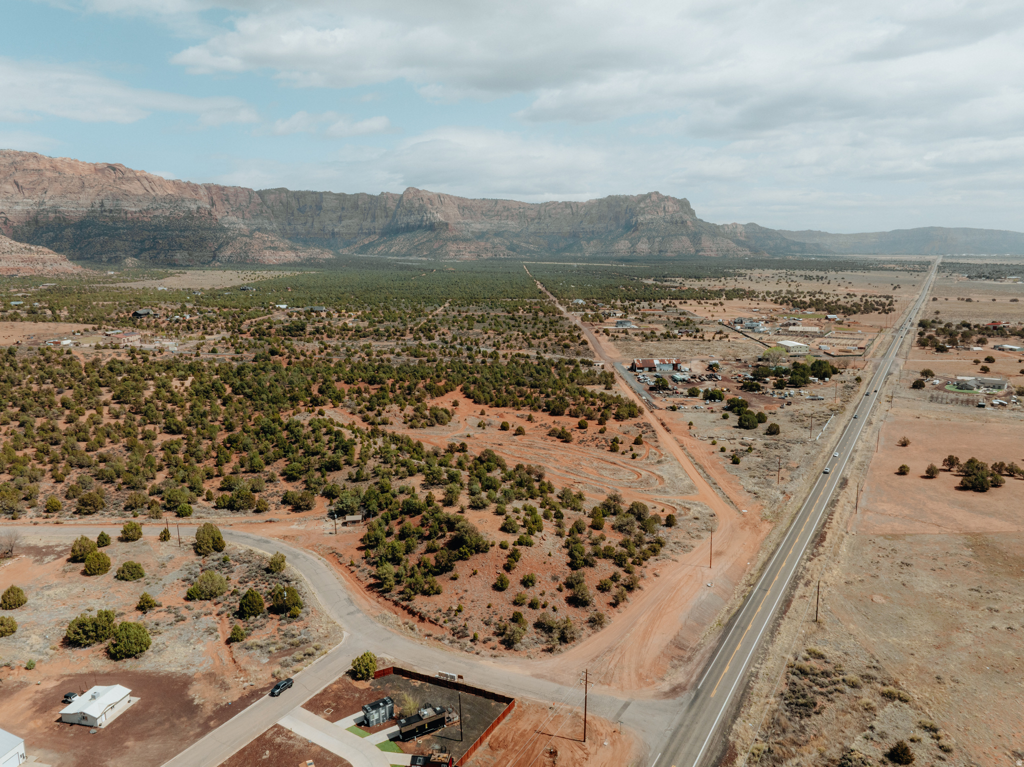 Tucked next to BLM land, this one-of-a-kind 2.33-acre view lot offers a unique opportunity to own your own hill with unobstructed views that stretch for miles. Imagine waking up every day to breathtaking scenery and the tranquility of nature right at your doorstep. Currently zoned as open space, this property provides the perfect canvas for your dream home or a serene getaway. With the surrounding BLM land, you'll enjoy privacy and access to outdoor adventures, making it an ideal spot for nature lovers and those seeking a peaceful retreat. Don't miss out on this rare gem!