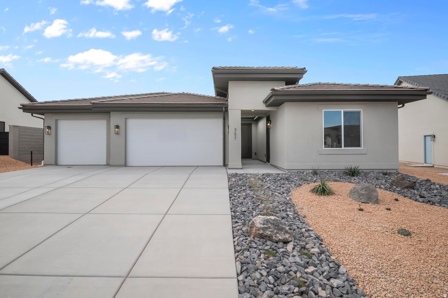 Single Level Living the Oasis Plan including a PRIVATE CASITA and a 3RD CAR GARAGE! This The Casita features a private entrance, separate bedroom, and washer/dryer hookups. Perfect space to use as a rental or for hosting family/friends. Estimated completion June. Ask me about our generous home warranty & Permanent Interest Rate Buy-Down. Improving quality of life here at Long Valley with an 18-hole putting course and driving nets, Clubhouse, pools, pickleball courts, movie lawn, hiking and biking trails, Dixie Power electricity, the list goes on! Actual home may differ in color, material, and/or options.