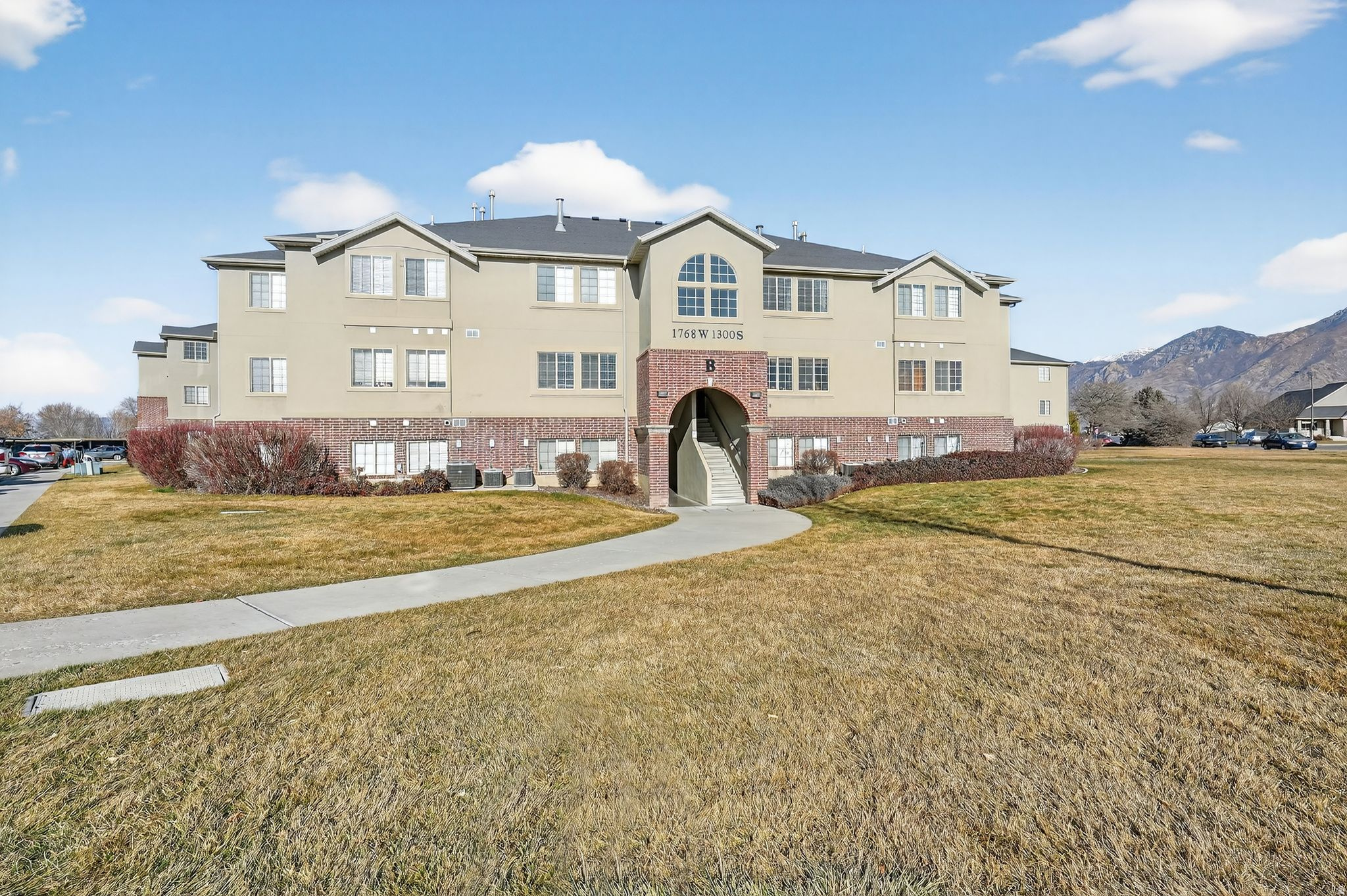 **RECENTLY RENOVATED-NEW CARPET, PAINT, CABINETS, AND COUNTERTOPS**Located in beautiful Springville, known for its welcoming atmosphere, mountain views, and strong sense of community, this well-maintained 3-bedroom, 2-bath condo offers a comfortable and functional layout designed for everyday living. With a convenient location near I-15, shopping, dining, and everyday amenities, this home provides easy access while still being part of a quiet, residential community.  Residents enjoy a great selection of community amenities, including a year-round indoor pool, fitness center, clubhouse, fenced playground, and covered parking-perfect for active lifestyles and gathering with friends and neighbors. Whether you're spending time at home or enjoying the shared spaces, this community is designed to support connection and convenience.  With quick access to outdoor recreation and city conveniences, this condo offers the best of Springville living-a beautiful place to call home and grow. Don't miss the opportunity to own in one of Utah County's most welcoming communities.