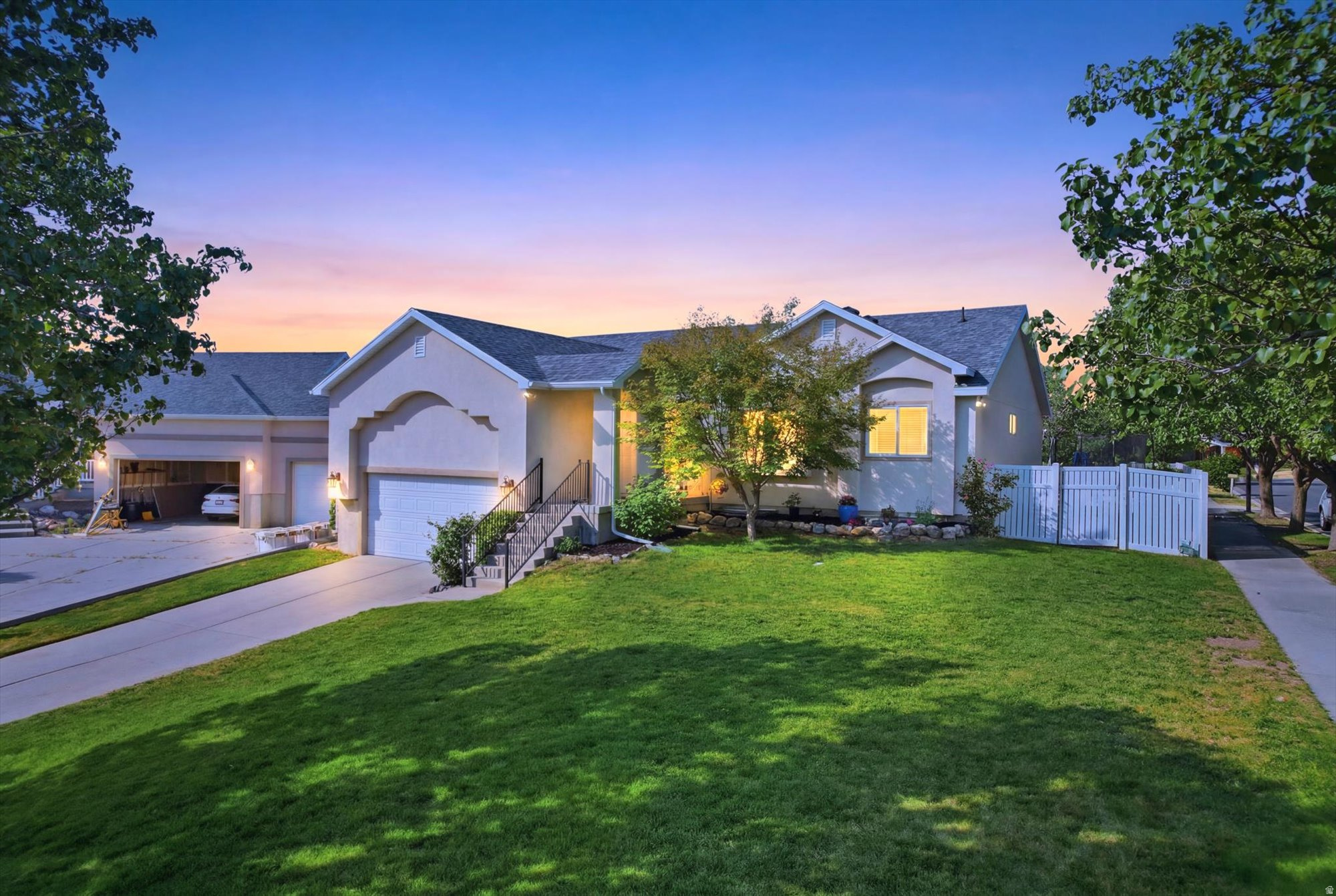 Tucked away on a quiet corner lot within a cul-de-sac, 14344 Debrian Way welcomes you with striking curb appeal under a brand new, durable 40-year roof. Step inside to find 2,869 square feet of meticulously updated living space, featuring vaulted ceilings, updated flooring, and expansive windows that flood the main level with natural light. The heart of this home is a fully remodeled, gourmet kitchen boasting crisp white cabinetry, a deep farmhouse sink, and a vibrant contrast island perfect for entertaining. With 5 spacious bedrooms and 3 bathrooms, including a primary suite upgrade, that also opens directly to an outdoor deck, where you can enjoy mtn views and a cherry and pear tree.  This home perfectly blends everyday life with updated design and absolute comfort.  Additionally, it features over 400 square feet of built in storage above the garage, perfect for those who need a bit of extra space! Schedule your tour today to see the details in person!
