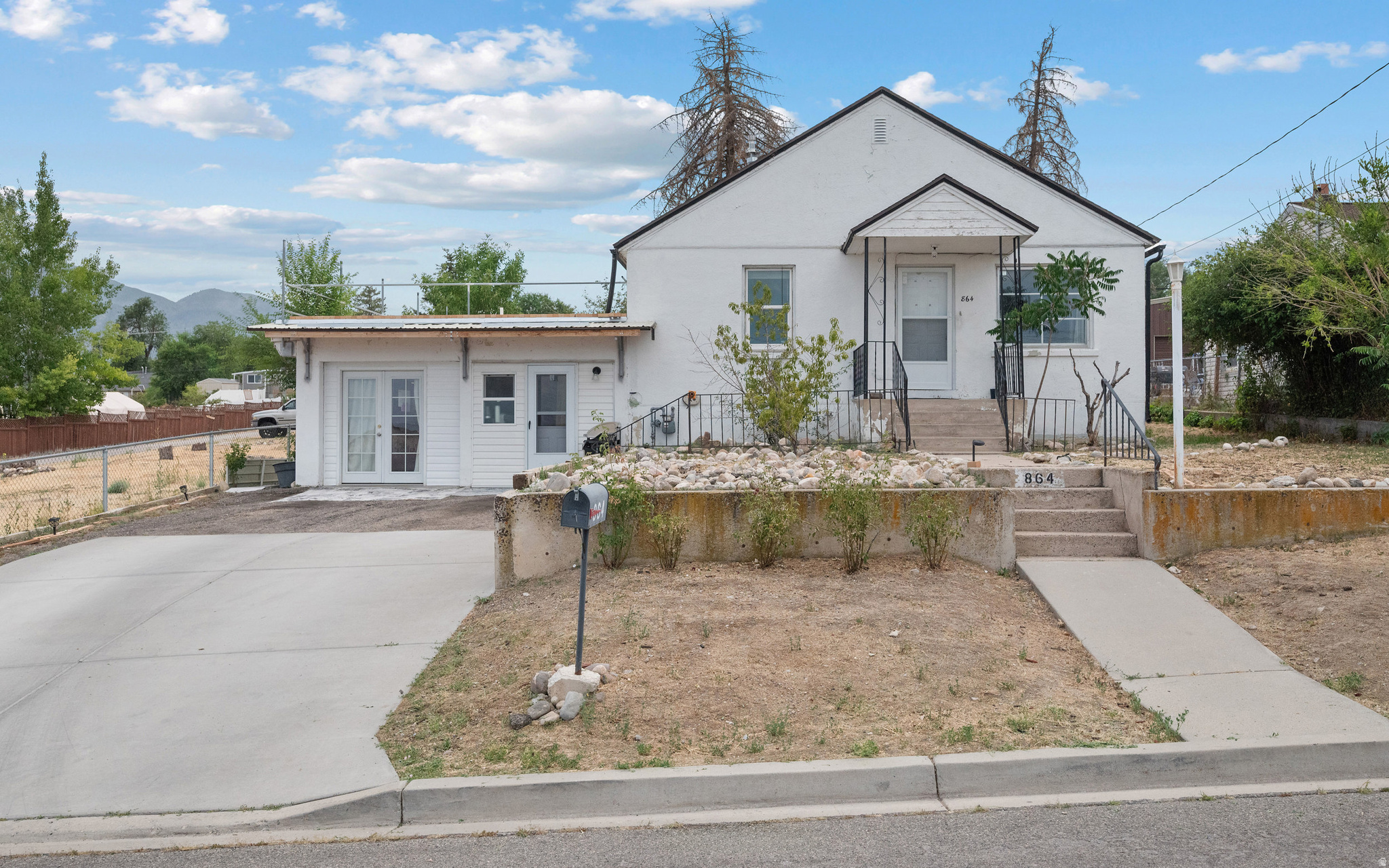 Live in one, rent the other! This property pairs a classic 1940s bungalow with an attached 1 bed/1 bath accessory unit, currently occupied at $800/month with market upside. A chance to let your home help pay its own mortgage, at a price point where opportunities like this almost never come along! The main home offers 2 bedrooms, 1 bath, and approximately 967 sq ft of comfortable single-level living with timeless character. Freshly painted and move-in ready today, with room to add your own updates and build equity along the way. The attached accessory unit (approx. 723 sq ft) comes equipped with its own kitchen and laundry in a market where 1-bedroom rentals are scarce. Also conveniently located just 5 minutes to I-15 for an easy commute up the corridor, and about one mile to the mouth of Payson Canyon. With Payson Lakes, the Mount Nebo Loop, hiking, and world-class scenery practically out your back door. Close to parks, schools, shopping, and historic downtown Payson. All information including sq footage is deemed reliable but not guaranteed, Buyer/Buyer's agent to verify.