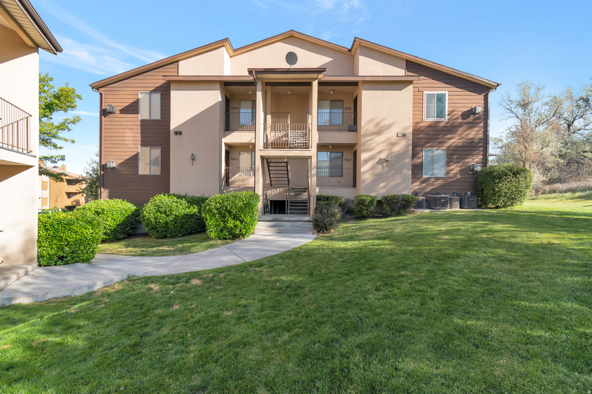 This beautifully updated condo is in a prime Sandy location! Offering a bright, open-concept layout with a spacious living area, perfect for both everyday living and entertaining. The kitchen features ample cabinetry and a large island that flows seamlessly into the main living space, complete with a cozy gas fireplace and access to a private deck. The primary suite includes a generously sized walk-in closet and an en-suite bathroom, creating a comfortable and functional retreat. Great news! The refrigerator and washer/dryer are INCLUDED and the furnace is brand new as of 11/25! Featuring a rare opportunity to have TWO secured parking spaces in the garage, plus a dedicated storage unit-hard-to-find features in this community. Enjoy resort-style HOA amenities including a clubhouse, fitness center, pool, sauna, and tennis courts. Conveniently located near shopping, dining, and easy freeway access, this property offers low-maintenance living with exceptional value. Call today to schedule a showing!