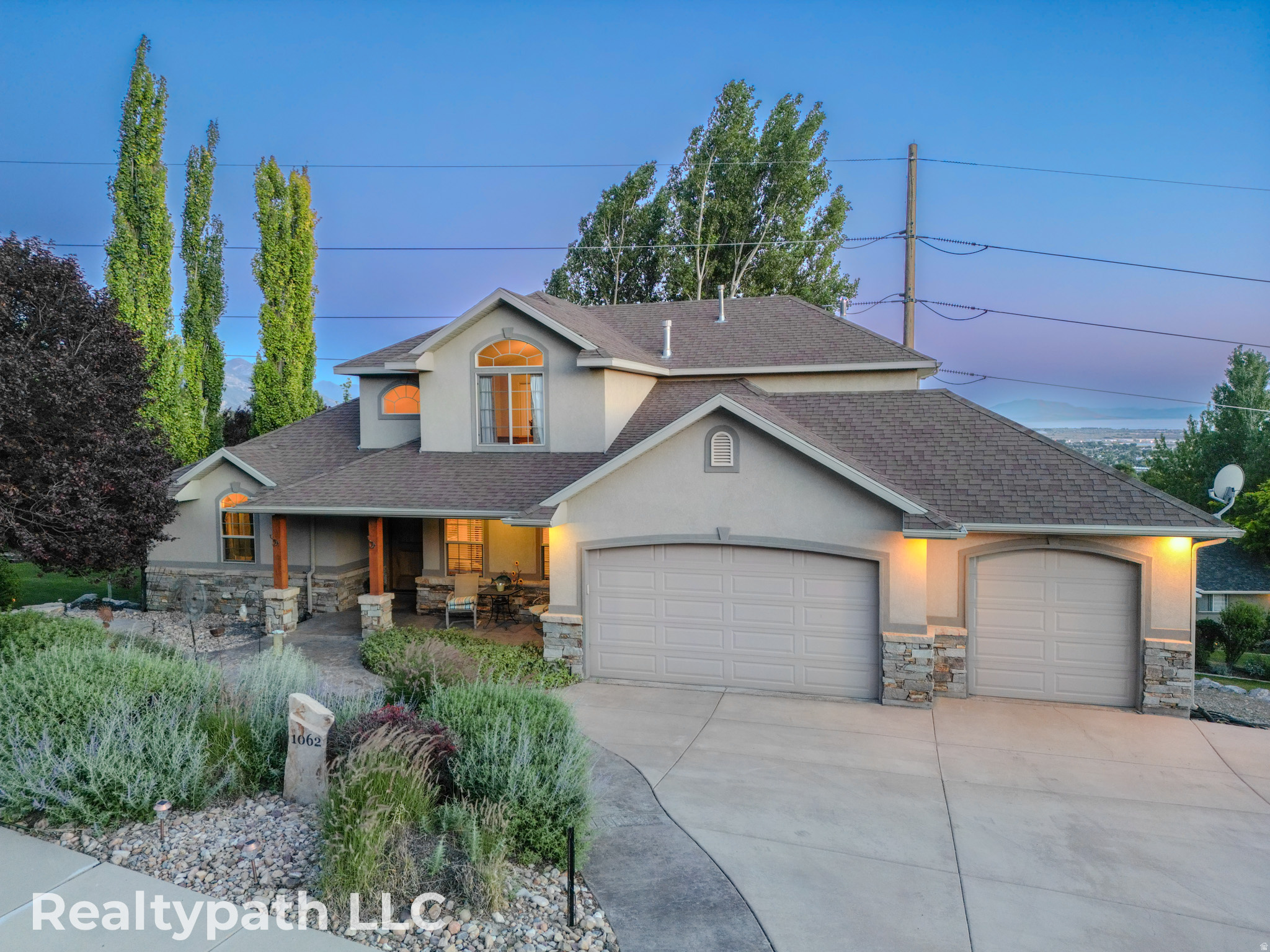 Nestled in the desirable Mahogany Ridge area of Pleasant Grove, this stunning home offers breathtaking views of the valley and majestic mountains. With three generous living rooms, there's ample space for family living and entertaining. The walkout basement provides additional living space and direct access to the covered deck overlooking the premium landscaping. This home perfectly blends indoor comfort with outdoor enjoyment, creating a serene retreat.  RV parking on the side. Schedule your private showing today! All information herein is deemed reliable but is not guaranteed. Buyer is responsible for verifying all listing information, including square feet/acreage, to buyer's own satisfaction.