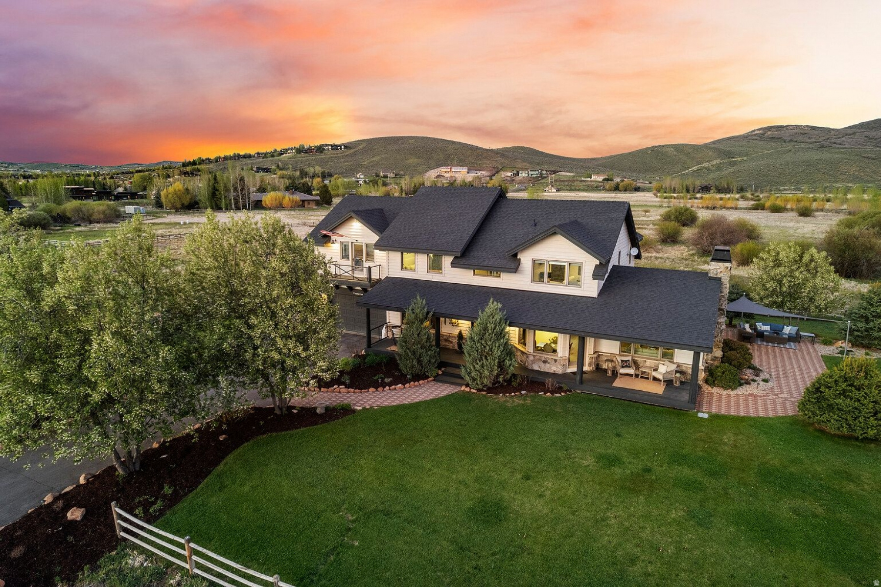 This rare 4.5-acre property in the heart of Park City's coveted Old Ranch Road neighborhood offers the peace, quiet, and wide-open feel of true rural living--yet remains just minutes from Kimball Junction's amenities, top-rated schools, and world-class skiing, hiking, and biking. Set amidst protected wetlands and expansive open space, the property delivers a sense of privacy and connection to nature that is increasingly hard to find. Step out your door to the newly expanded Old Ranch Road trail system, providing easy access to miles of scenic paths for walking and biking providing easy access to Willow Creek Park and the endless trails in Round Valley.  The perfect year-round Base Camp for the Park City lifestyle. With sweeping resort views from the covered front porch and a prized end-of-street location, the home enjoys a tranquil setting where wildlife is part of everyday life--fox, Sandhill cranes, and even migrating elk herds are frequent visitors. The surrounding open space not only enhances the views and serenity, but also preserves the natural beauty and low-density character that make Old Ranch Road so special. The 4-bedroom, 3.5-bath home is thoughtfully designed to capture views from nearly every room, including the renovated, oversized upstairs family room, complete with an additional kitchen and laundry area--ideal for guests or flexible living. A spacious outdoor patio and boulder fire pit create inviting outdoor gathering spaces, perfect for taking in the fresh mountain air and stunning surroundings.  If you're looking to expand, the sellers have commissioned conceptual plans by renowned local architect Constantino Grandjacquet, offering a thoughtful vision for adding more space and a bit more flexibility to the home.  This is a rare opportunity to enjoy acreage, privacy, and direct trail access in one of Park City's most sought-after neighborhoods.