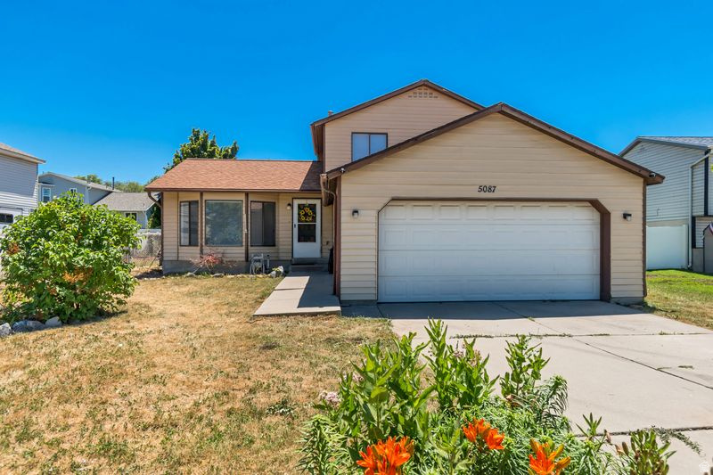 Cozy multi-level home in a quiet cul-de-sac. Home just recently remodeled with new painted, new flooring, new vanities and new fixtures.  Home equipped with paid off SOLAR panels, which leave you super low cost in your power bill. Vegetable garden with mature trees and fully fenced yard.