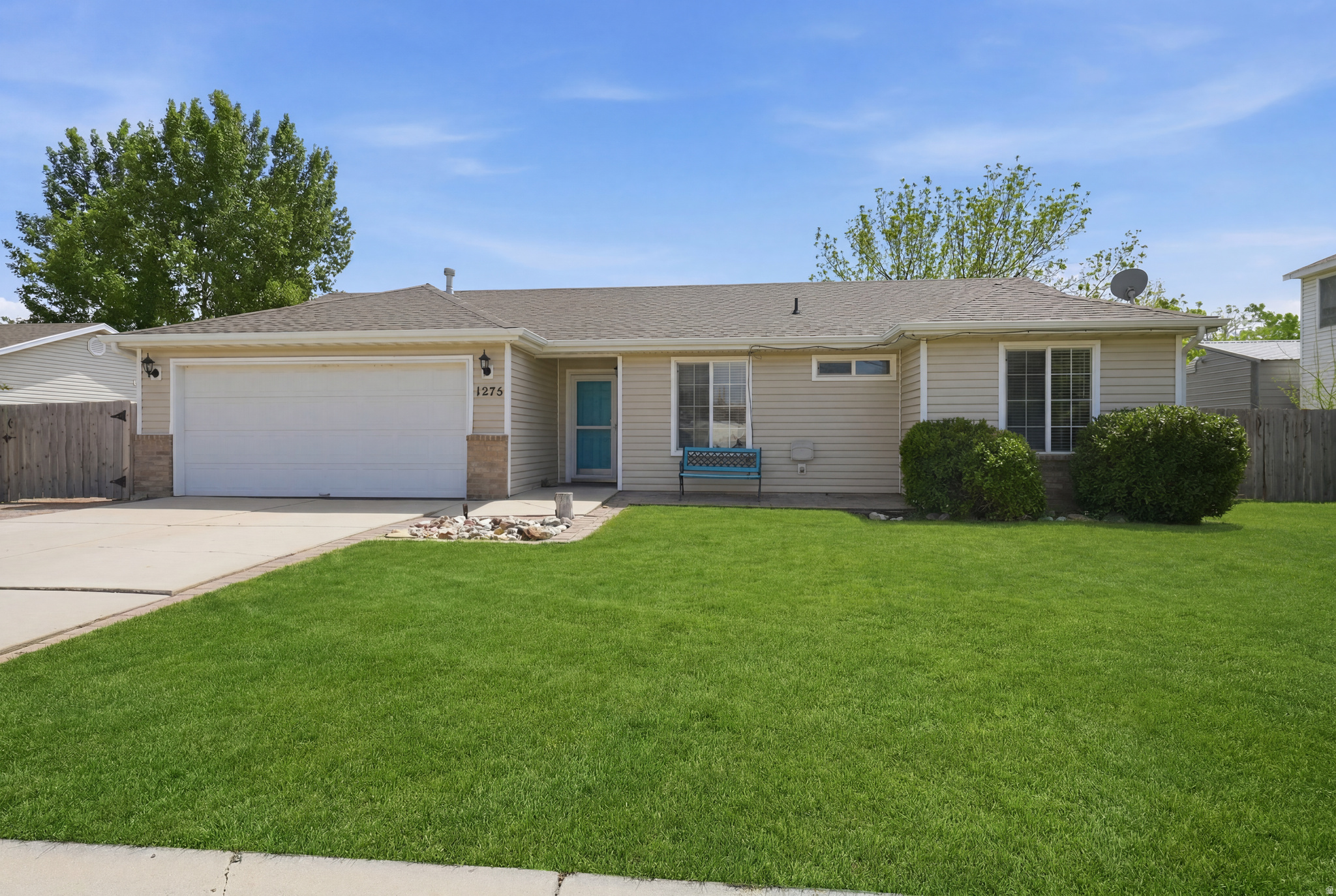Welcome to this Beautiful single-family home located in an established, mature Lehi neighborhood. The single-level floor plan features a bright, open-concept layout with vaulted ceilings that enhance the natural light throughout the primary living spaces. Freshly painted walls provide a clean, modern aesthetic, offering a blank canvas for you to move right in and add your own custom touches. This highly functional, low-maintenance design fits a variety of lifestyles and is situated just minutes from Silicon Slopes and the I-15 tech corridor. The home includes a spacious attached 2-car garage for parking and projects. Outside, you will find a large yard with a designated garden space and a private storage shed in the backyard, perfect for extra equipment and tools. Ideally located near premier local dining, shopping, and top-tier Alpine District schools. Schedule your private tour today!