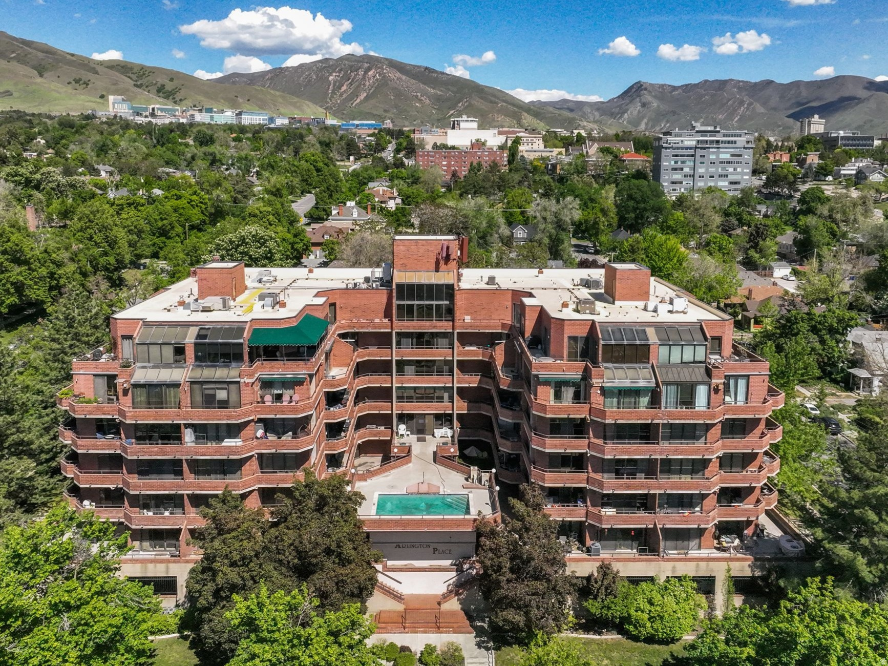 *** WALK TO UNIVERSITY OF UTAH *** Location, light, and views make this condo truly special. Perfectly situated within walking distance of the University of Utah and just minutes from downtown and 9th & 9th, this is an ideal spot for student housing, a smart rental investment, or a great place to call home. The flooring, paint, and kitchen are all brand new. The south-facing unit provides natural light year-round, and two sliding glass doors open to a private patio with sweeping views of the valley, the Oquirrh Mountains, and downtown. Watching the sun set from the balcony might just become your new favorite hobby. Inside, you'll enjoy the convenience of an in-unit washer and dryer and a covered parking stall. The building also offers great amenities, including a secure entrance, pool, hot tub, gym, sauna, and clubhouse. Whether you're looking for a convenient place to live or a solid investment, this condo delivers on every level.