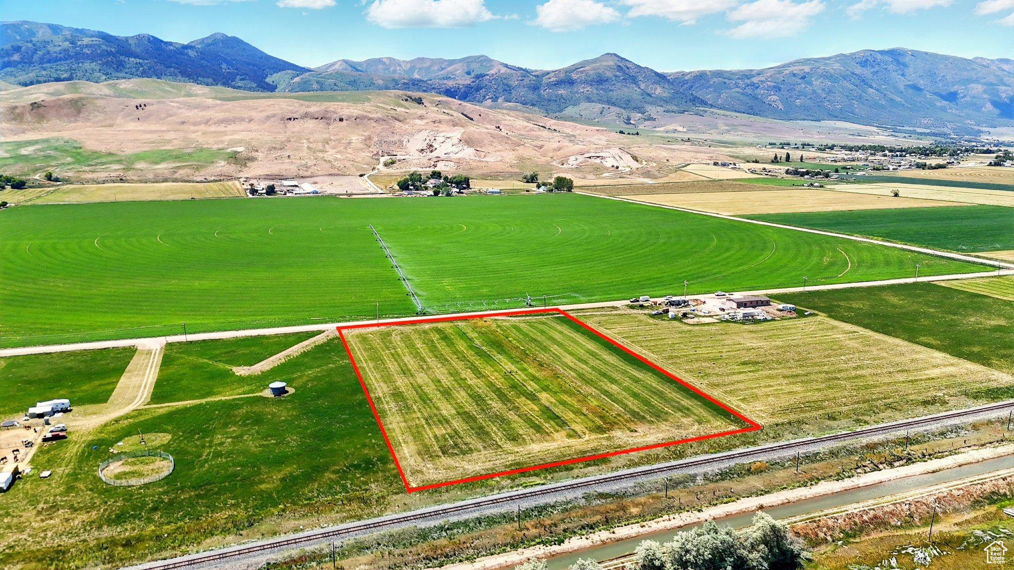 Build Your Dream Home in Beautiful Clifton, Idaho! Lot 4 of North Clover Estates offers 5.05 acres of irrigated farmland - an ideal canvas for your custom home. With 2 shares of irrigation water included, this property boasts panoramic mountain views and peaceful surroundings just minutes from Twin Lakes Reservoir. Whether you're looking to create a private retreat or a hobby farm, this lot offers both serenity and potential. Opportunities like this don't come often-secure your slice of Idaho today! Address is Approx Buyer to verify all information.