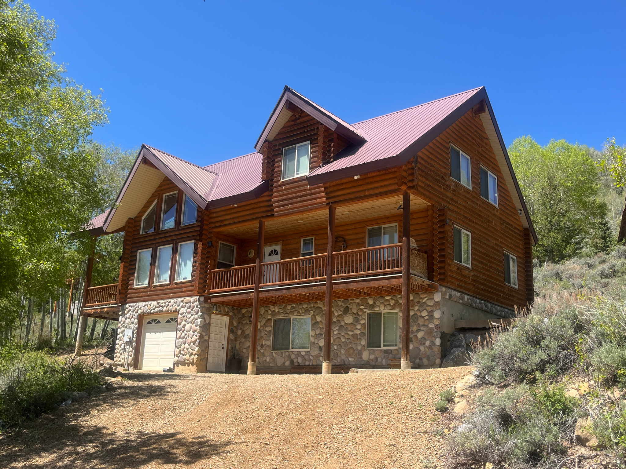 Discover the perfect combination of relaxation and adventure in this charming 3 story log cabin nestled among Quaking Aspens in the Scofield Mountain Home Subdivision that is West of Scofield Reservoir and a few minutes to fishing, ice-fishing, and other lake activities or to miles and miles of trails through the Manti La Sal Forest. This home is 90 minutes from Utah County and 2 hours from Salt Lake City. Featuring a huge loft for lots of people to sleep, in addition to the 4 bedrooms and 3.5 baths. Beautiful craftmanship including log staircase, Knotty Alder cabinets and doors, and lots of tongue and groove ceilings. The great room has large windows and vaulted ceilings. Only one family has built, owned, and loved this cabin. Access on snow packed roads is by ATV or tracked vehicles. Come make this mountain retreat yours! Square footage figures are provided as a courtesy estimate only. Buyer is advised to obtain an independent measurement.