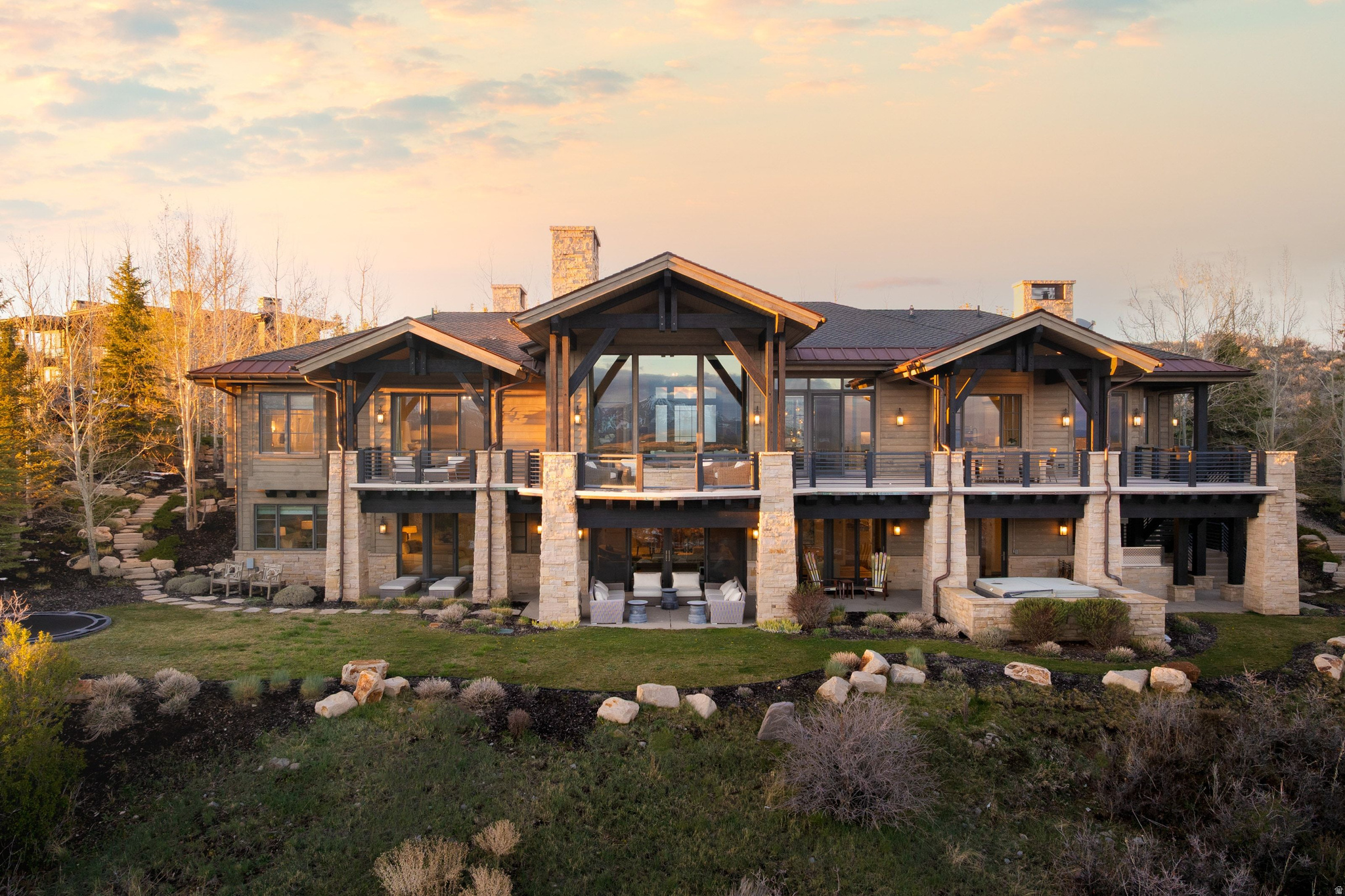 Experience exceptional mountain living in this meticulously crafted residence by Don Craig Construction, designed in collaboration with Otto Walker Architects. Thoughtfully built with quality and timeless design at the forefront, this six-bedroom, all-ensuite home offers both comfort and sophistication at every turn.  From the moment you enter, you're welcomed by premier south-facing views of Deer Valley's ski runs--perfectly framed to capture year-round beauty and natural light throughout the main living spaces.  The outdoor living experience is equally compelling. The expansive back deck is fully outfitted for entertaining and relaxation, featuring a custom hot tub, fire pit, and sweeping 270-degree panoramic views spanning the Uinta National Forest and the iconic Wasatch Back ski mountains--creating an unforgettable setting for both sunrise and sunset moments.  Ideally positioned within close proximity to the Promontory Village Clubhouse, the home offers a short, easy walk to a full suite of amenities including golf, fitness, tennis, basketball, bowling, dining, and more--making it effortless to enjoy everything the community has to offer.  A rare opportunity to own a thoughtfully designed, impeccably built home in one of Promontory's most desirable locations.