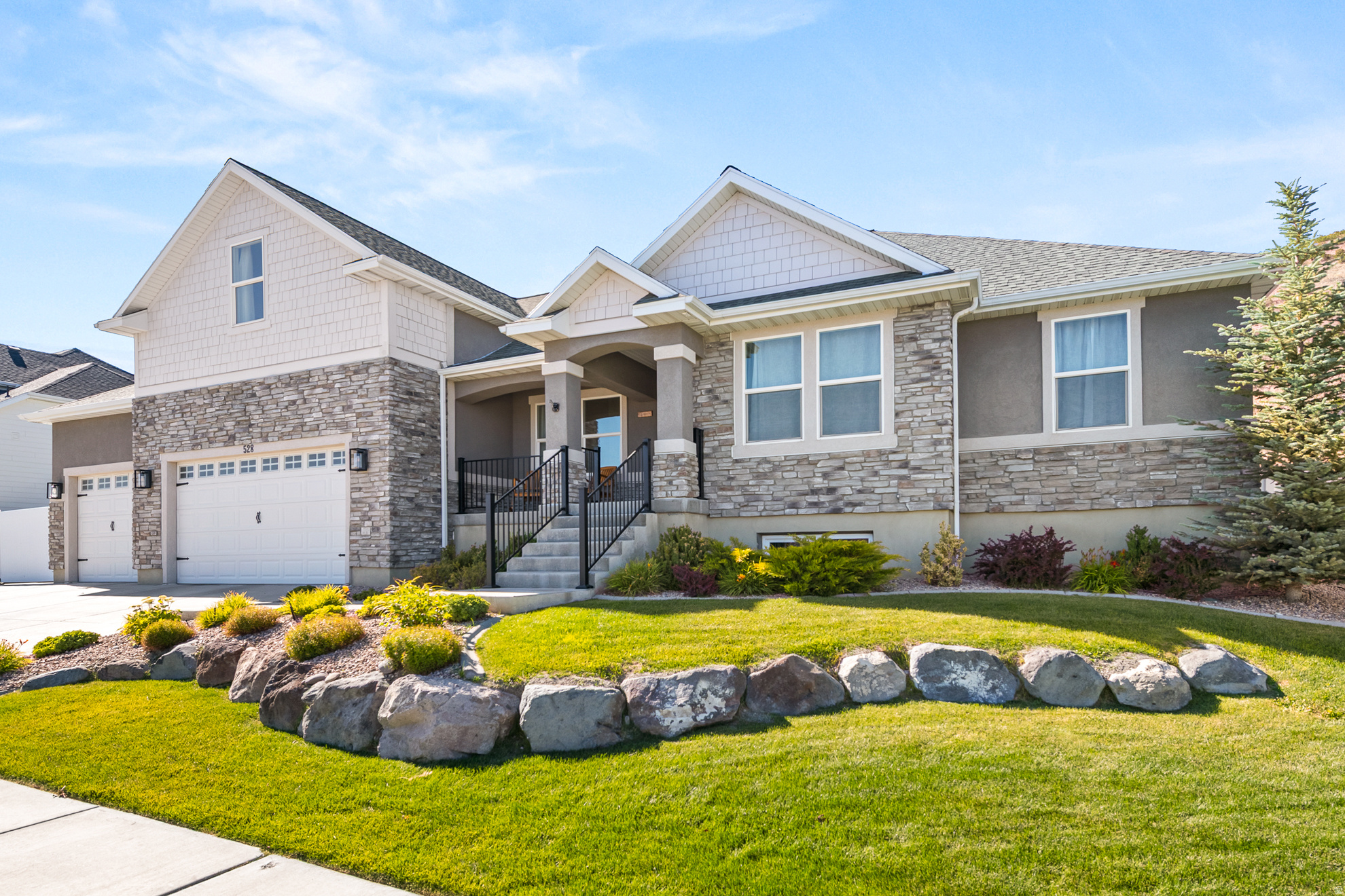 OPEN HOUSE SATURDAY JUNE 27th 10:00am-4:00pm  MOVE-IN READY WITH RV PARKING, LARGE, PRIVATE BACKYARD WITH OUTDOOR KITCHEN, FIREPLACE, GARDEN BOXES AND STEPS AWAY FROM HIKING AND BIKING TRAILS.   Imagine serene mountain living with all the amenities of a planned community. Built in one of the best locations in this prized hilltop neighborhood, you'll enjoy endless views and the luxury of a large backyard that backs to open space. This modern two-story home is well designed with a sunny, vaulted great room, main floor primary suite plus 5 more bedrooms including a designer guest suite on the basement level. The basement level also has a large, comfortable family room with built-in theatre system, flex space for a home gym, office, and stubbed for a wet bar or second kitchen. There's a roomy 3-car garage, RV parking and plenty of storage. Adjacent to the kitchen with a walk-in pantry, you'll find a custom-designed outdoor kitchen outfitted with a 40" built-in grill, plus a ceramic Kamodo smoker. The outdoor space continues with a gazebo, fireplace, and a large grass area  the perfect site for soccer practice or summer outdoor movie nights! The neighborhood gathering spots include a community clubhouse, pool/spa, tennis courts, playground, and sport courts. Close freeway access allows for easy commutes to business hubs in Utah County and Salt Lake City, and the Salt Lake International Airport. Outdoor adventures are abundant with nearby ski resorts and recreational lakes and rivers, plus miles of trails for hiking, mountain biking, snowshoeing, horseback riding, and much more. * New fiber network options available for increased speed and competitive pricing.   FULL PROPERTY TOUR VIDEO IN LINK:https://my.matterport.com/show/?m=yhMHddbf1W2&mls=1