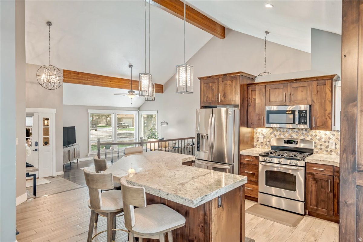Back on the Market!  Don't miss your chance to see this home! It is what your family has been waiting for!  Located on a quiet corner in a neighborhood you will love! Welcome to this exceptional east-side home perfectly situated in a very desirable area with mountain views. Not to mention top rated schools just minutes away.  This is a beautifully maintained home and is move-in ready for it's next family.  Step inside to an inviting open concept layout highlighted by vaulted ceilings and natural light, creating a bright and spacious atmosphere throughout.  The fully remodeled kitchen with modern finishes is the heart of the home built for real family life.  The primary bathroom has been completely remodeled and the additional bathrooms have both been updated.   The outdoor space is perfect for all families.  The backyard is a true retreat-complete with a large deck, shades, pool (the pool can stay or go), and hot tub. It's ideal for hosting gatherings or unwinding while enjoying the peaceful surroundings.  Buy with confidence! The major work is already done: Brand New Roof.  New HVAC/Furnace with the last 4 years. Vinyl fencing.  Remodeled Kitchen and upgraded bathrooms. RV Parking,  This home truly offers the best of lifestyle, comfort, and setting for the perfect family!