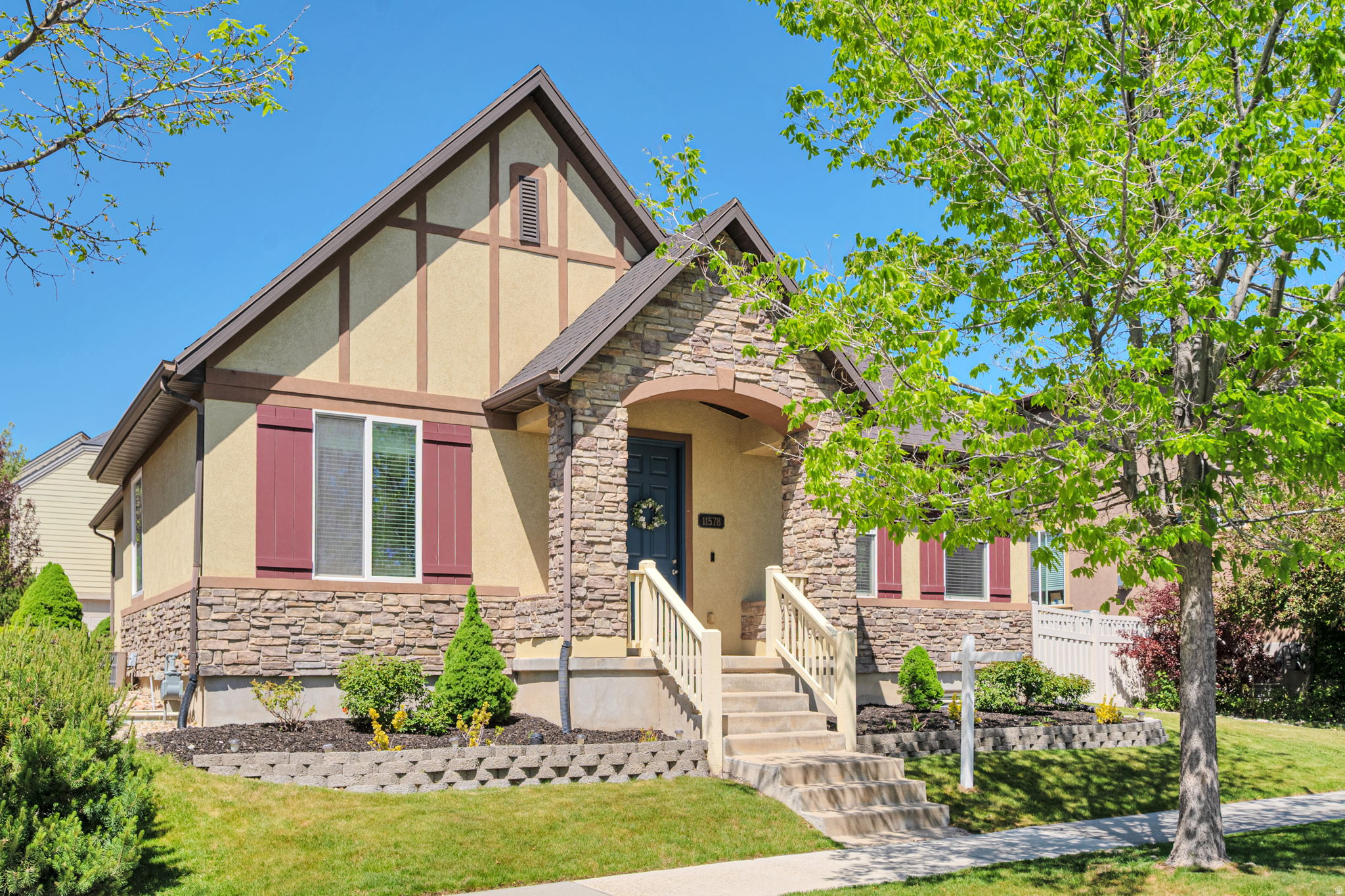 Prime Daybreak location in Founders Park, Steps from the Community Center, Daybreak Elementary, the District, and the Ballpark at America First Square.  This move-in-ready home features vaulted ceilings, an updated kitchen, remodeled primary bathroom, and laminated flooring on the main level. The fully finished basement adds a large family room, two bedrooms, a full bathroom, roomy mechanical/storage room, and fun kiddie cave under the stairs.  Enjoy a full fenced yard, covered patio, attached 2-car garage, and Google Fiber availability.  A polished, well-kept home in one of Daybreak's most walkable, convenient neighborhoods.