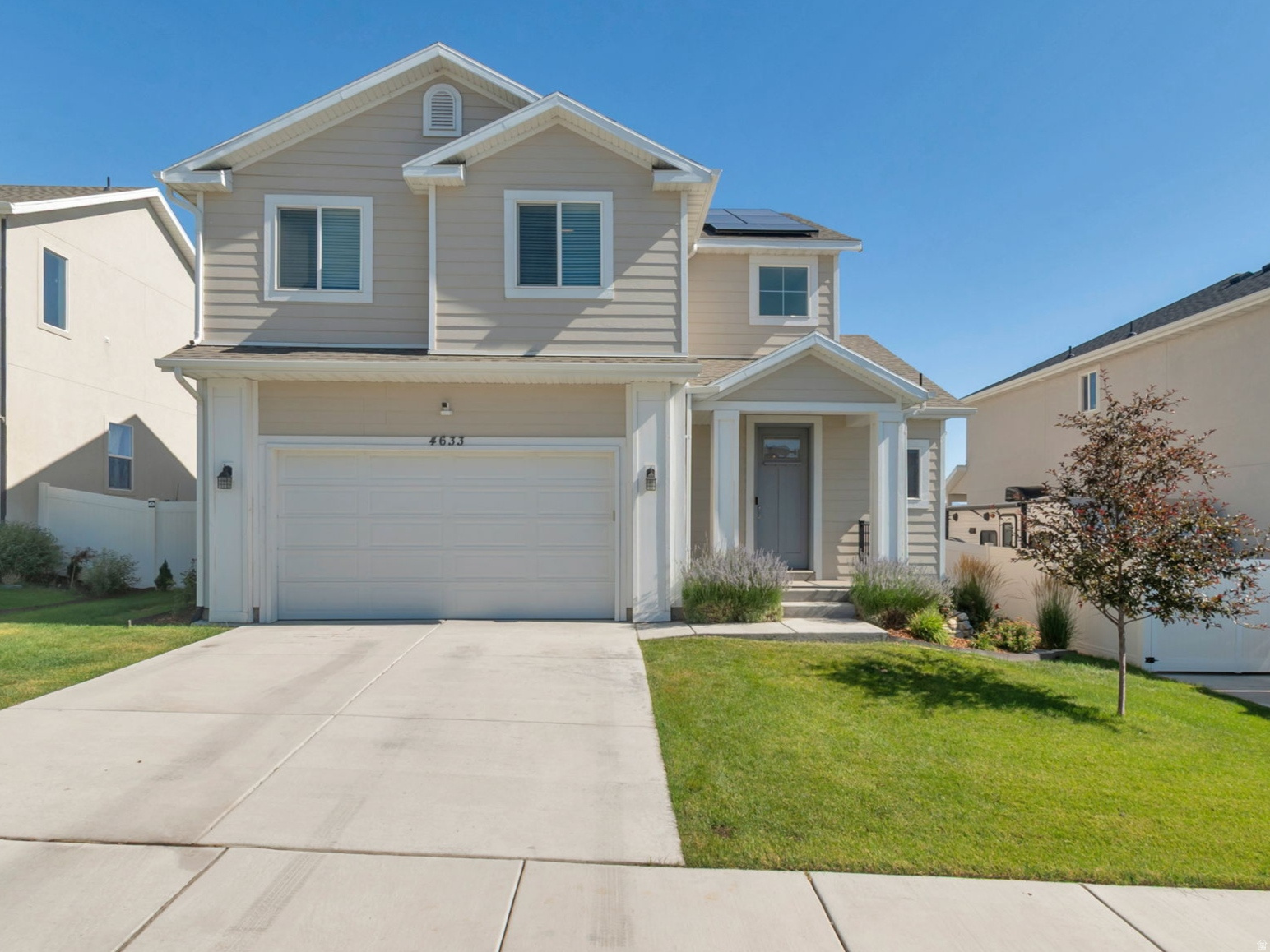 Welcome to one of Eagle Mountain's most desirable locations, perfectly positioned near the Saratoga Springs border and backing directly to a neighborhood park with unobstructed views and no rear neighbors. This beautifully upgraded Aspen floor plan blends modern design, functionality, and premium finishes throughout.  The bright open-concept main level features an upgraded kitchen with quartz countertops, a large center island, abundant cabinetry, and a custom built-in desk/workstation ideal for  managing everyday life. The spacious great room flows seamlessly into the dining area and out to an impressive custom covered deck, creating exceptional indoor-outdoor living and entertaining space.  Upstairs, you'll find a spacious primary suite with an upgraded bathroom, two additional bedrooms, and convenient second-floor laundry.  The basement features a nearly completed fourth bedroom with closet shelving to be completed by the seller, offering an easy opportunity to quickly add additional finished living space and value.  One of the home's standout features is the incredible backyard setting. Enjoy morning coffee or evening sunsets from the custom covered deck overlooking the park and open space beyond, a level of privacy and scenery that is difficult to find in today's market.  Additional features include owned solar panels for significant energy savings (seller will pay off the solar system with an acceptable full-price offer), a water softener, full automatic sprinkler system, professionally landscaped and fully fenced yard, and an oversized two-car garage.  Located near parks, trails, schools, and Saratoga Springs amenities, this is a rare opportunity to own one of the neighborhood's premier lots paired with thoughtful upgrades and exceptional outdoor living.   Square footage figures are provided as a courtesy estimate only and were obtained from tax data.  Buyer is advised to obtain an independent measurement.